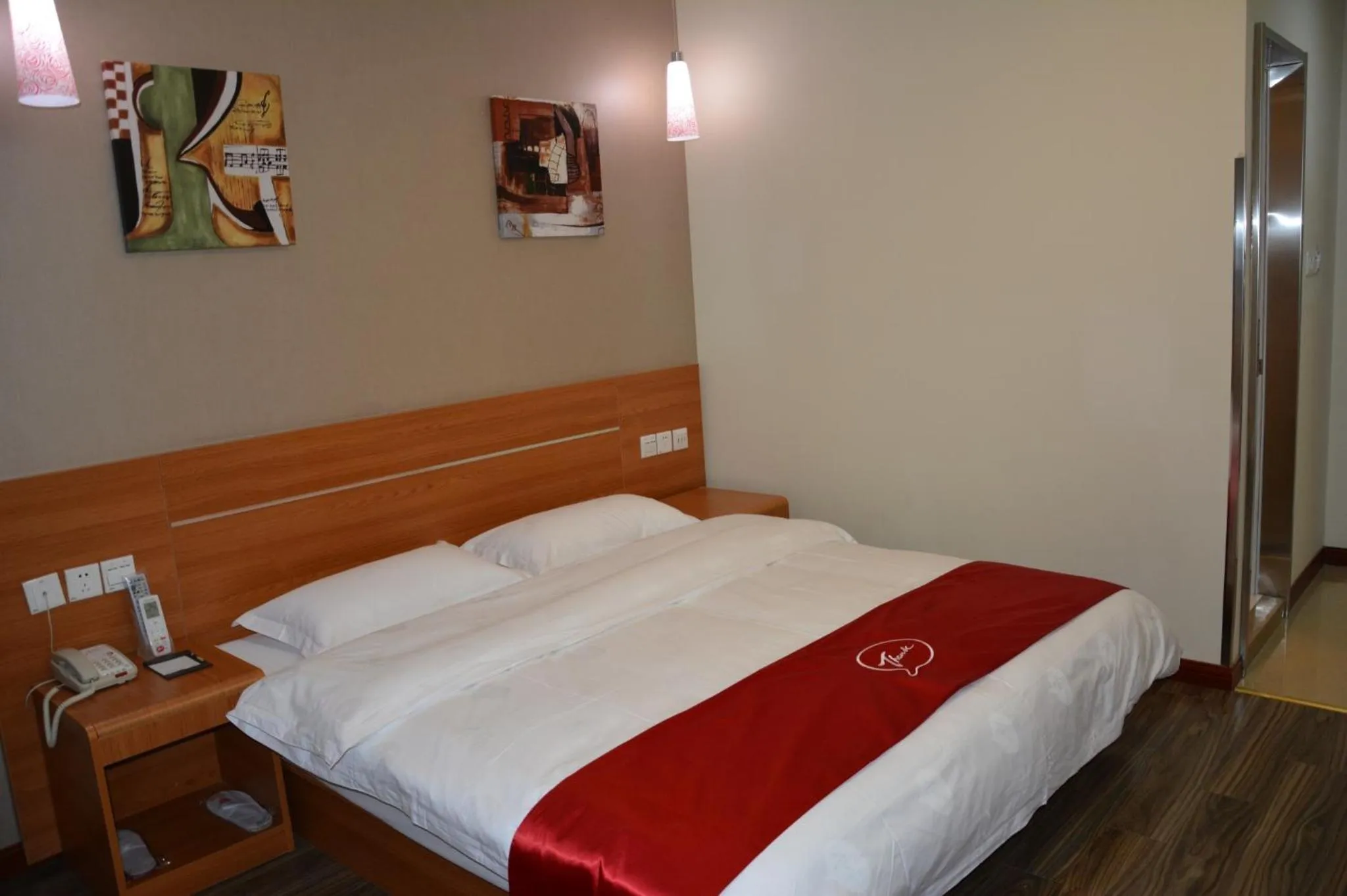 Bed in Thank Inn Chain Hotel Jiangsu Yangzhong Avenue