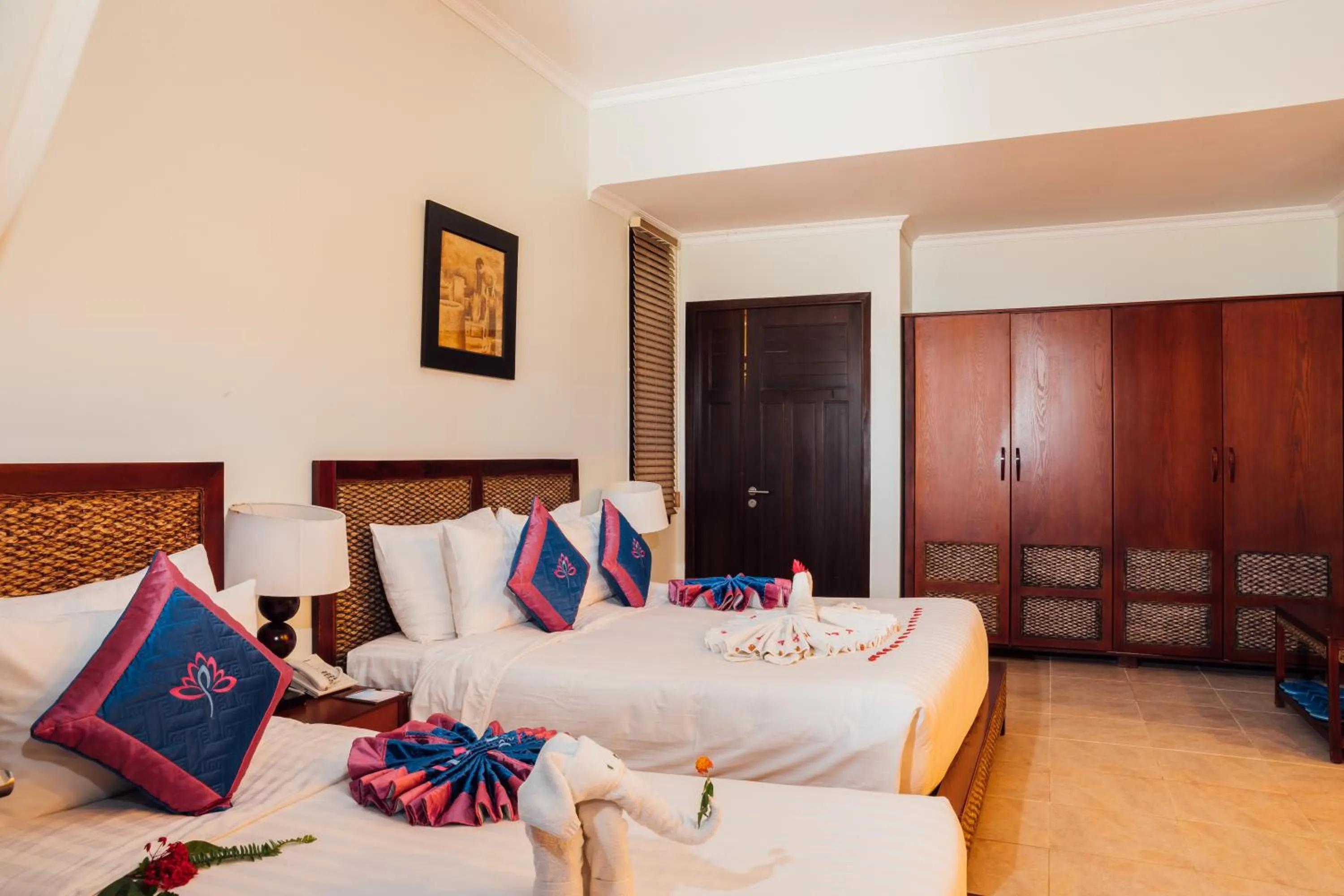 Bed in Lotus Muine Resort & Spa