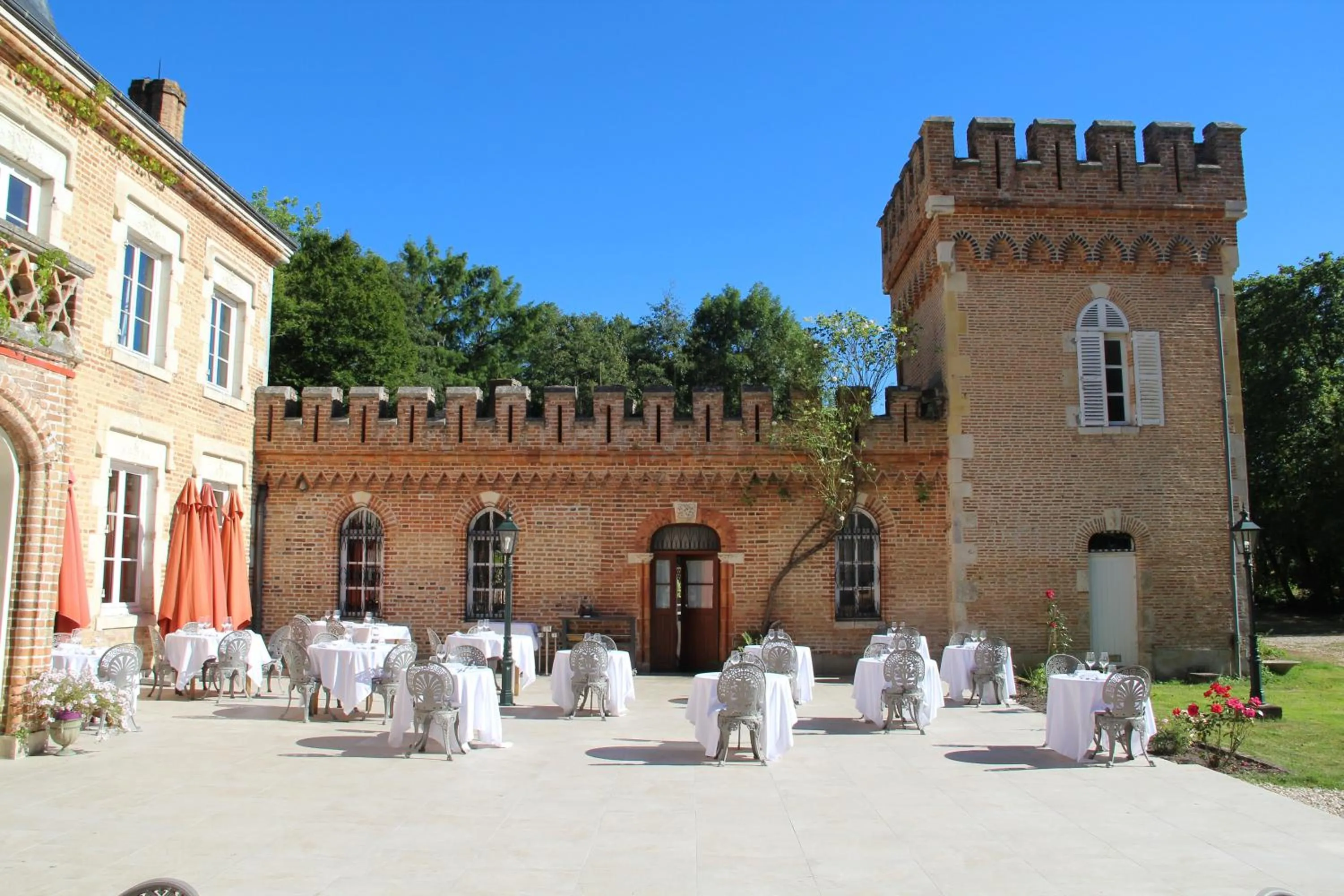 Patio in Hostellerie Du Château Les Muids