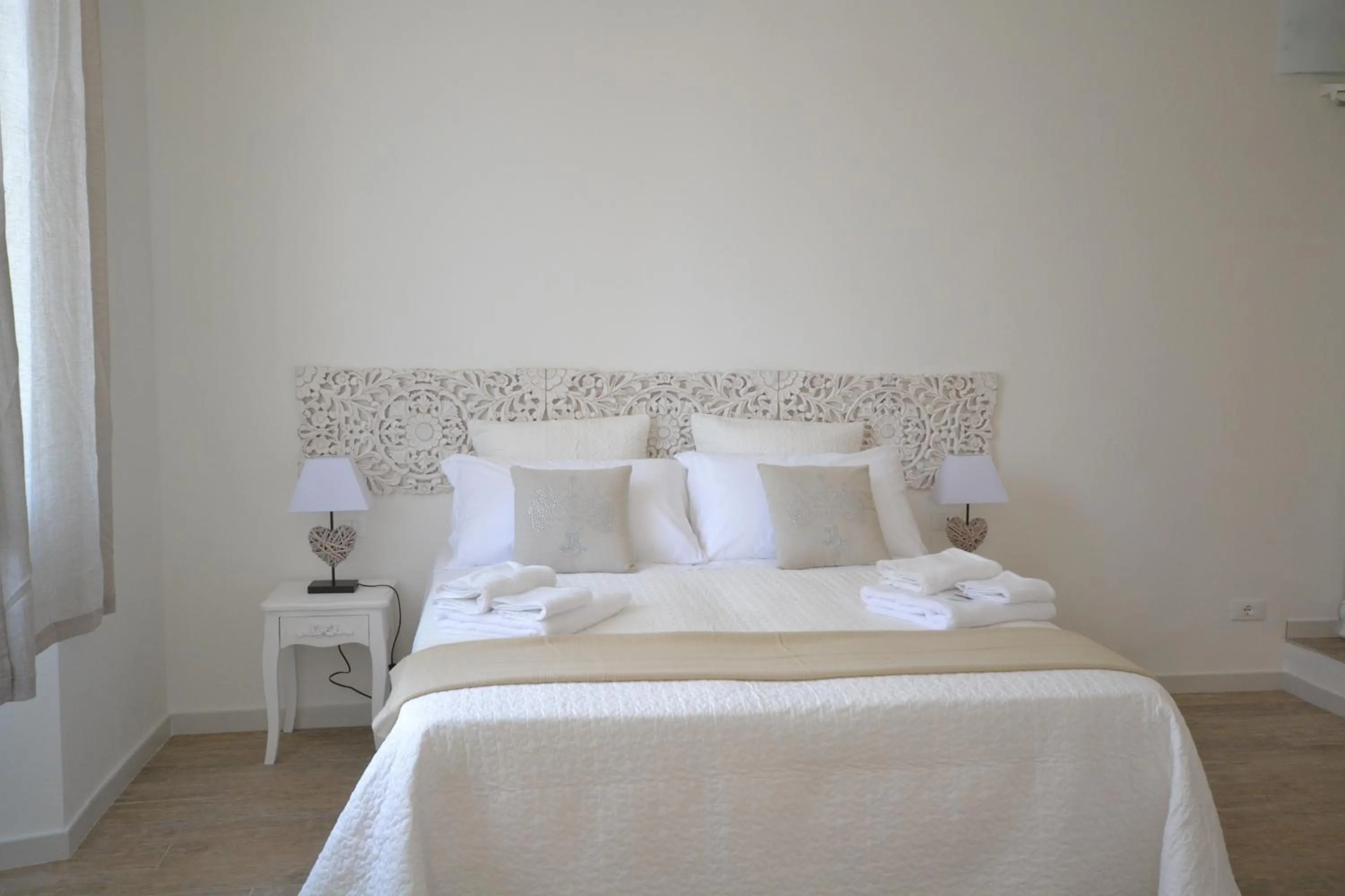 Decorative detail, Bed in Affittacamere Casa Dane'