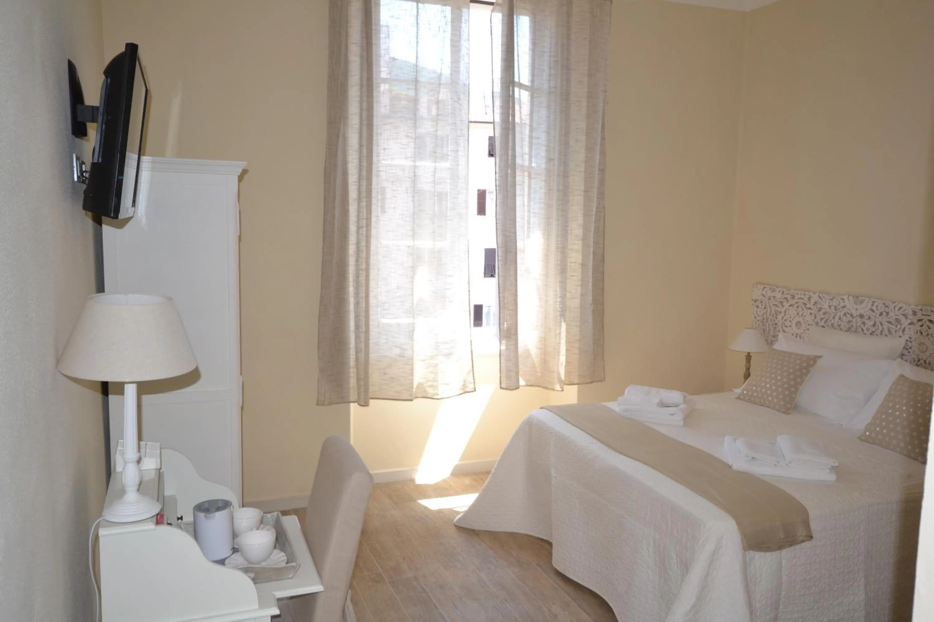 Decorative detail, Bed in Affittacamere Casa Dane'