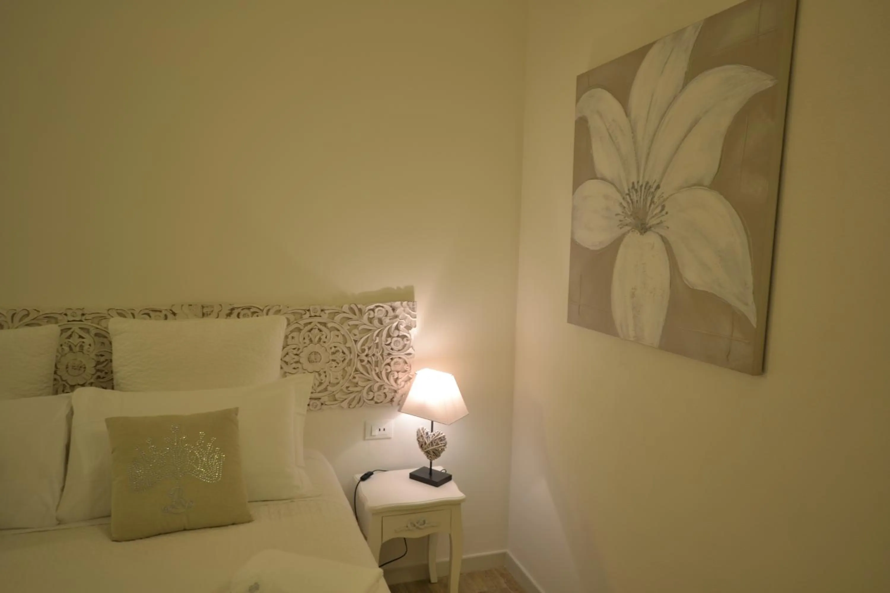 Decorative detail, Bed in Affittacamere Casa Dane'