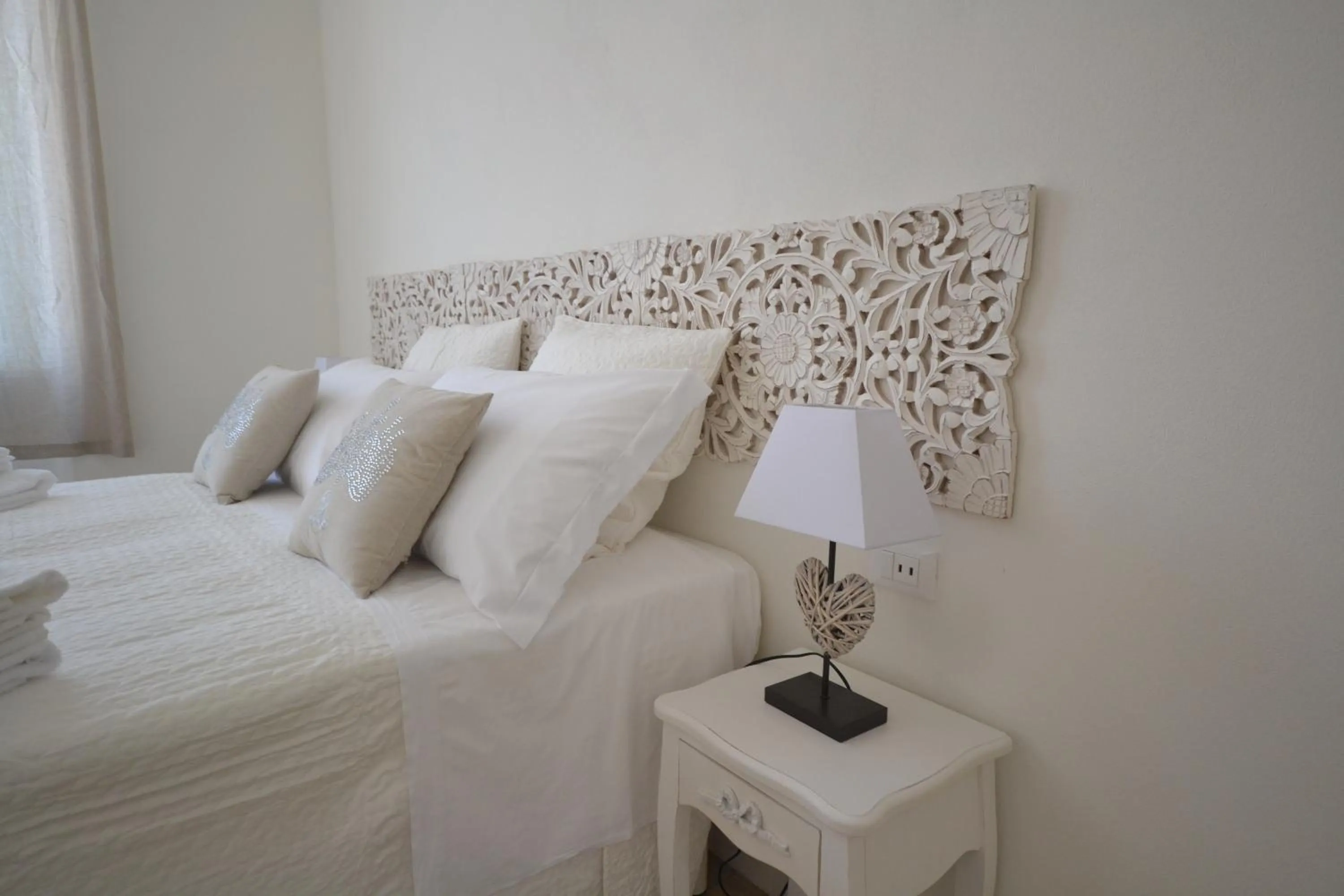 Decorative detail, Bed in Affittacamere Casa Dane'