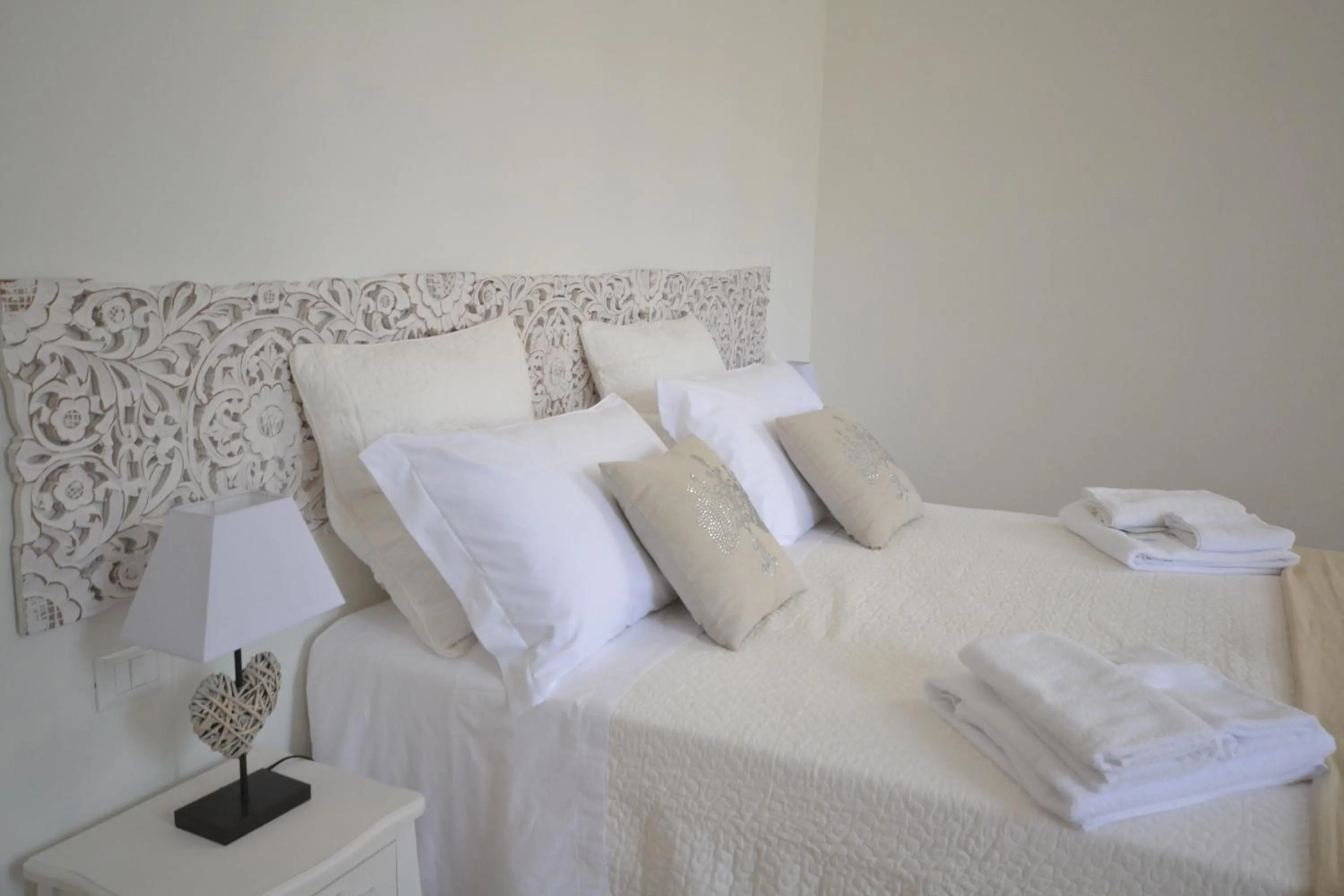 Decorative detail, Bed in Affittacamere Casa Dane'