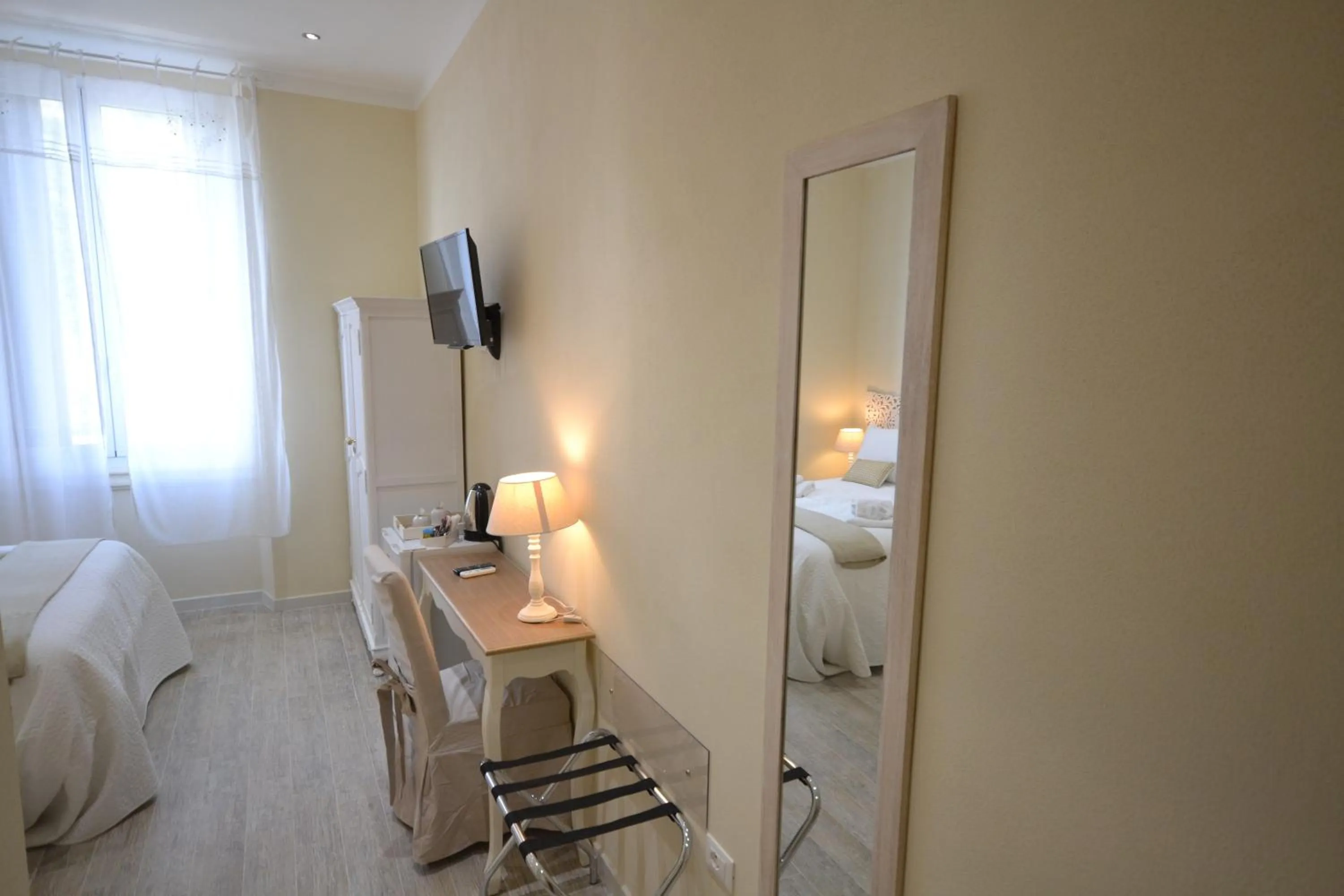 Decorative detail, Bed in Affittacamere Casa Dane'