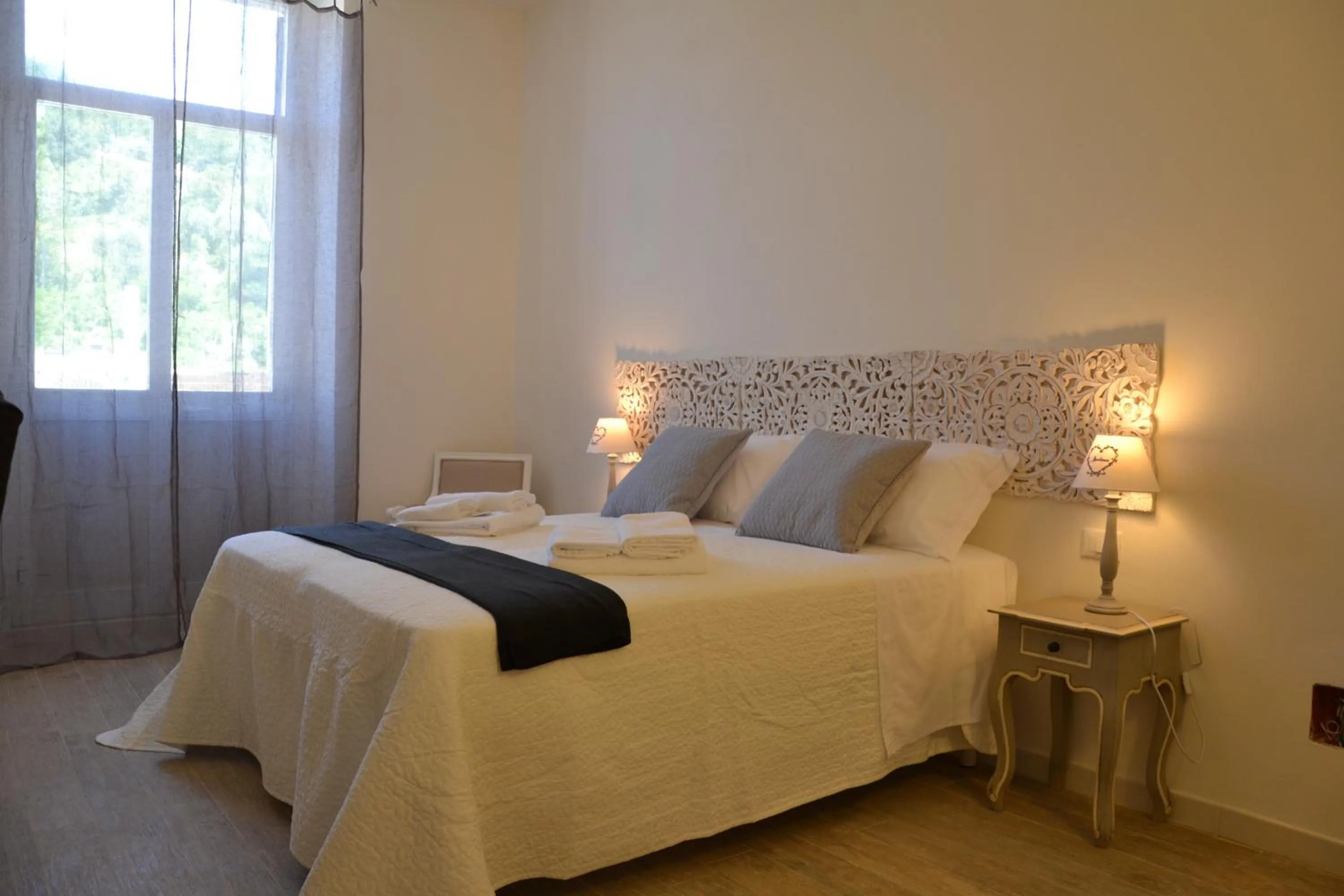 Decorative detail, Bed in Affittacamere Casa Dane'