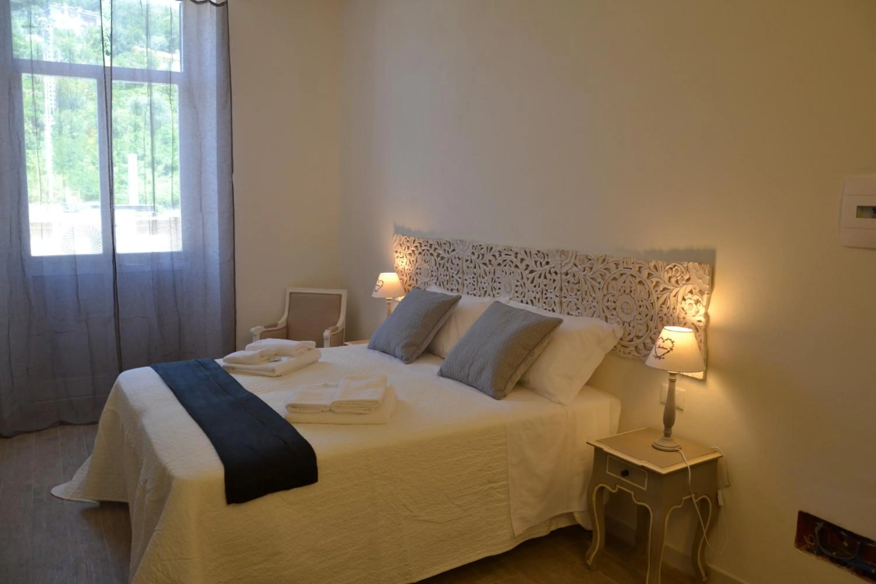 Decorative detail, Bed in Affittacamere Casa Dane'