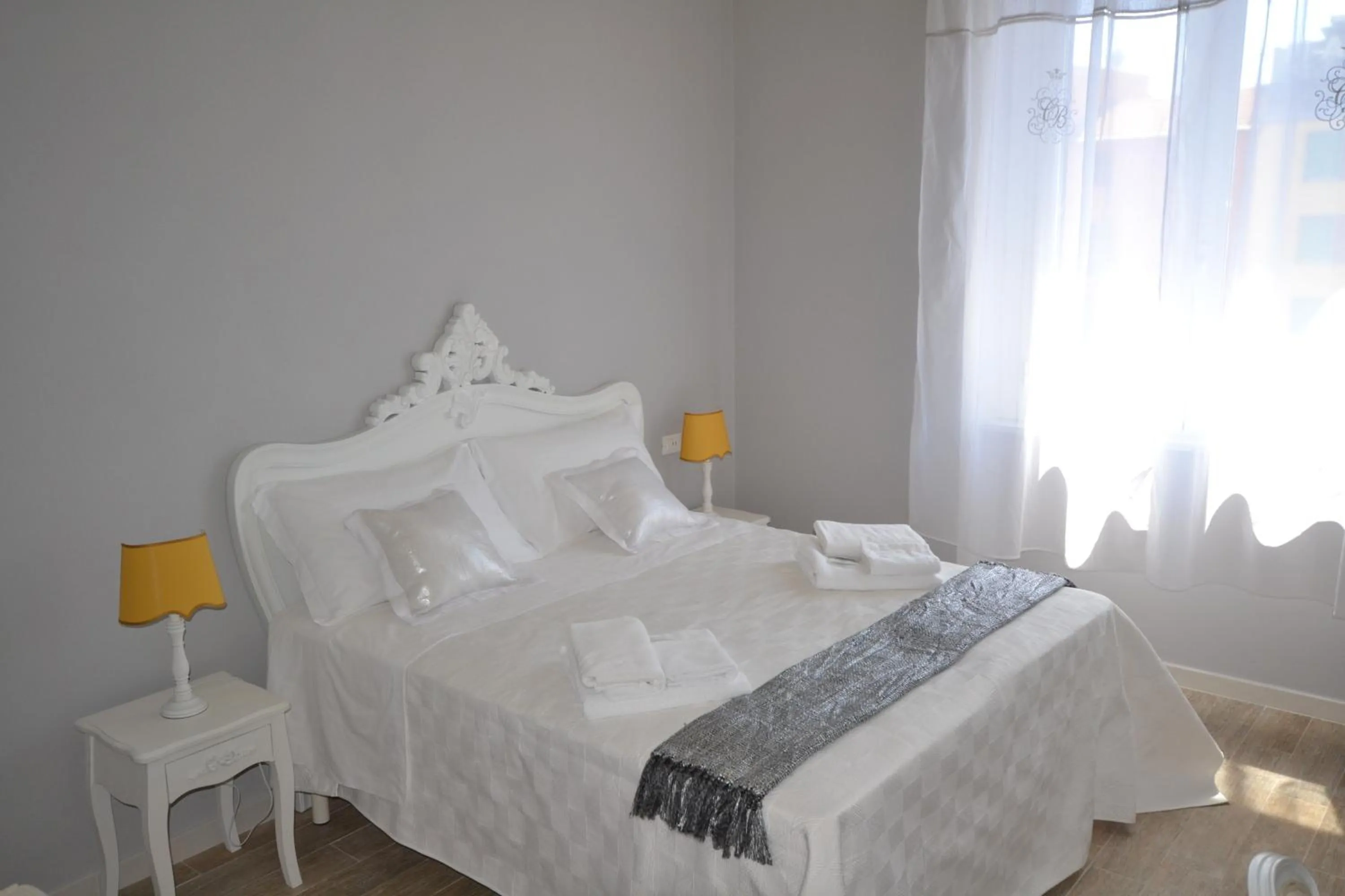 Decorative detail, Bed in Affittacamere Casa Dane'