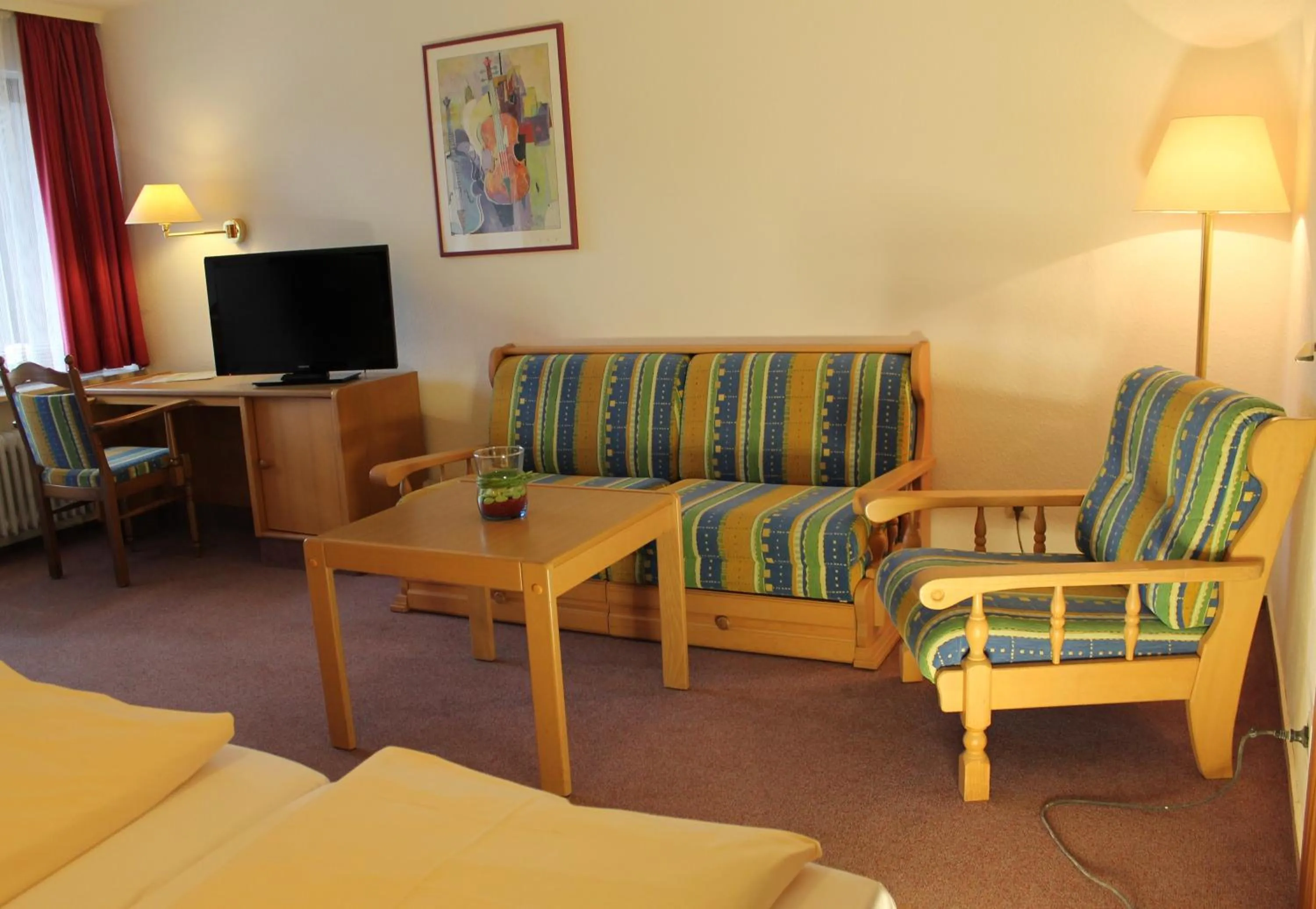 Living room in Action Forest Hotel - Kletterwald - Lasertag - nähe Badeparadies