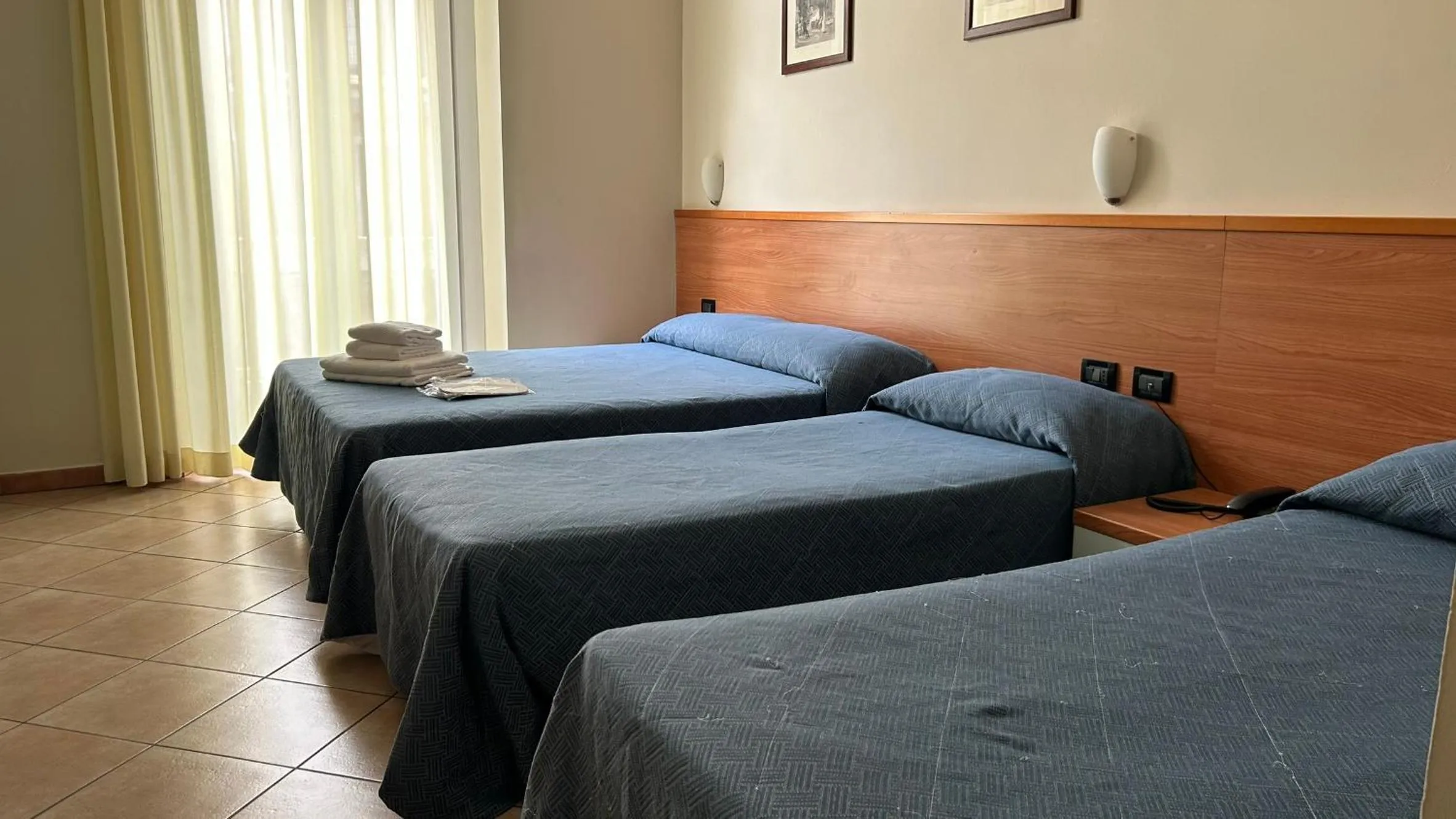 Bed in Albergo Salerno