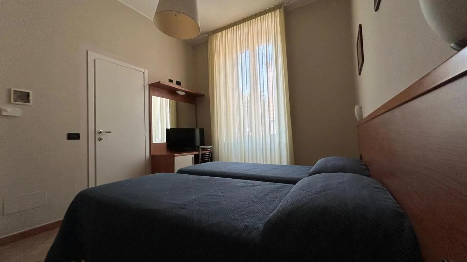 Bed in Albergo Salerno