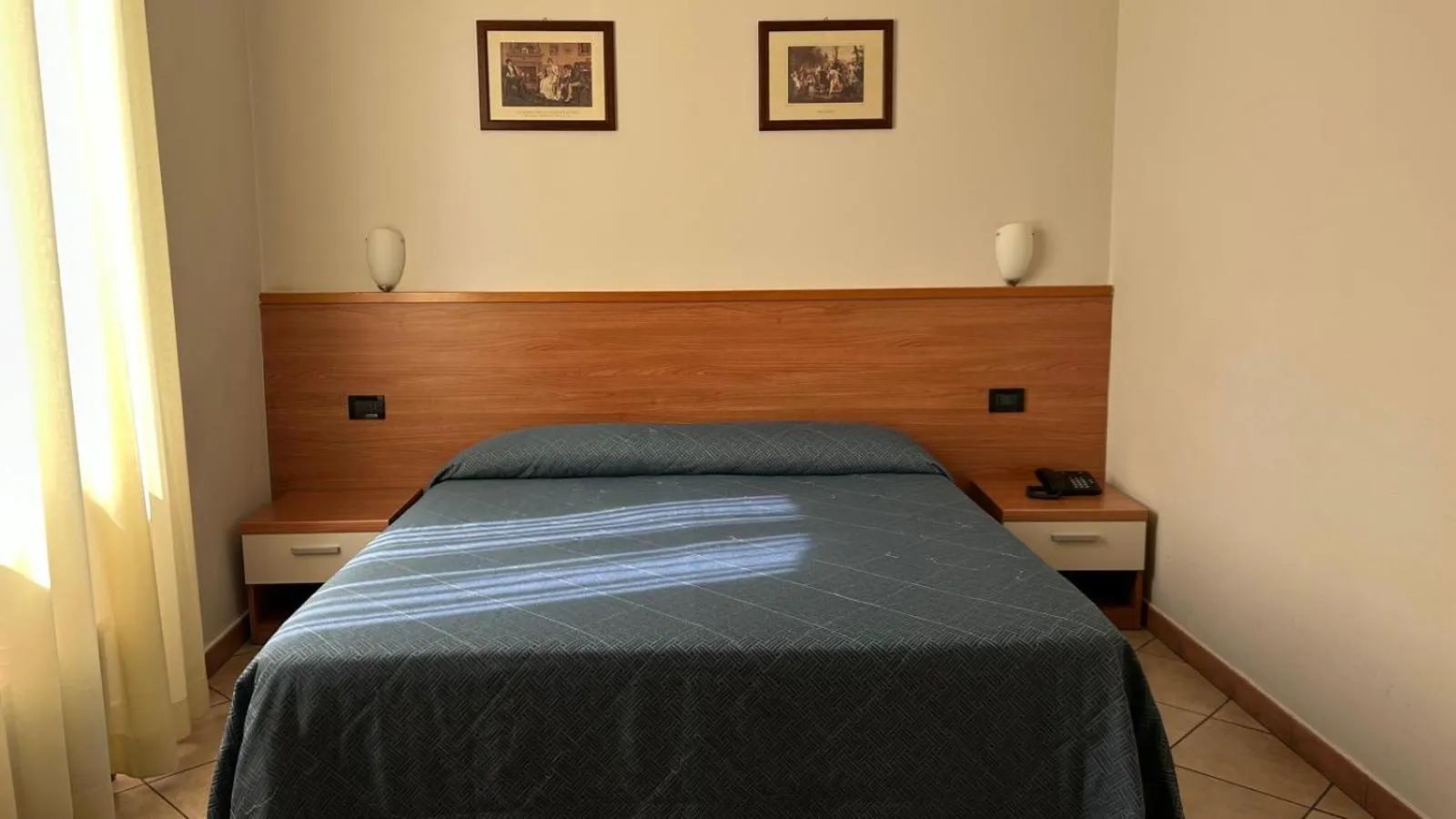 Bed in Albergo Salerno