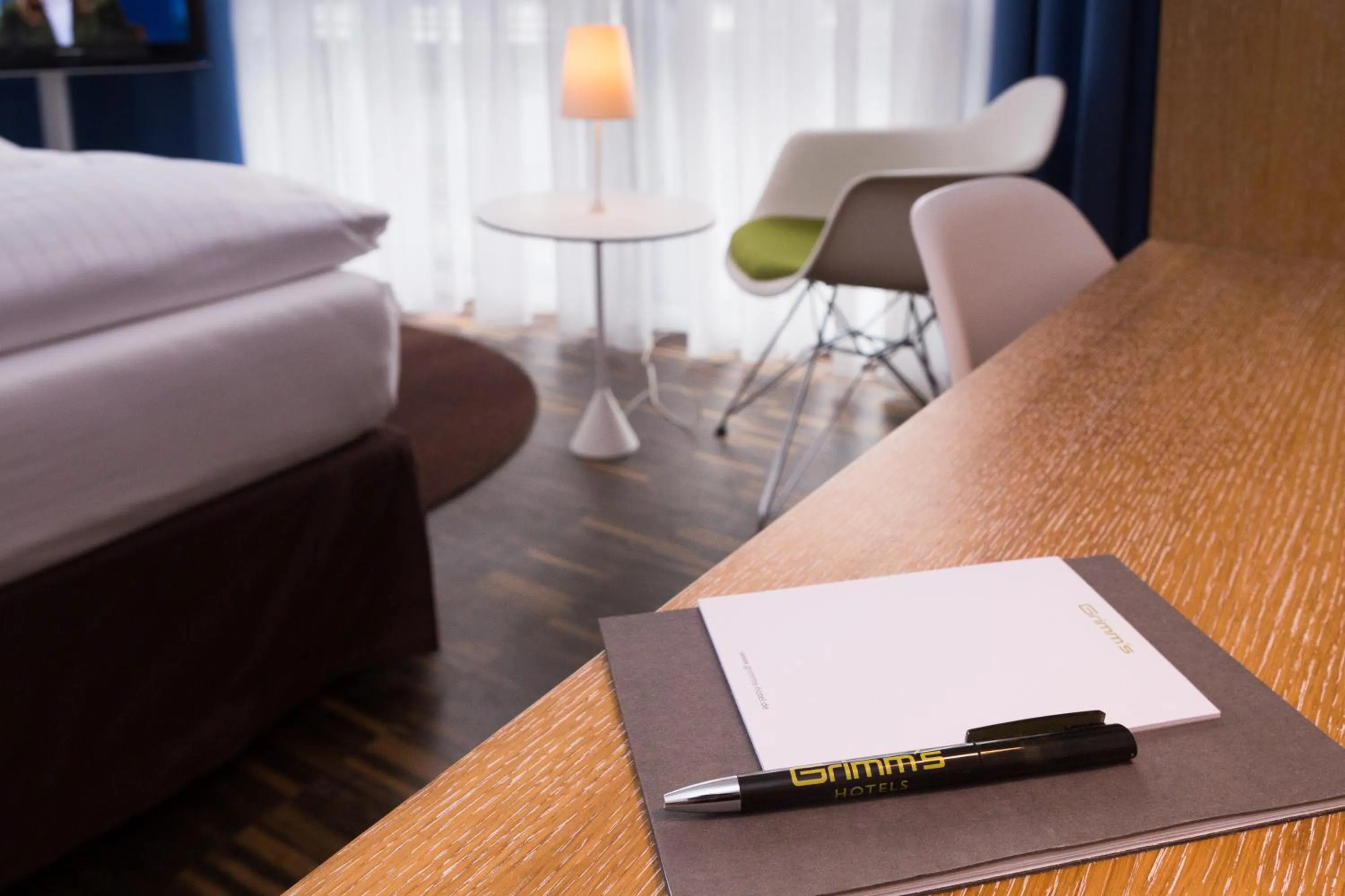 Property logo or sign in Grimm's Berlin Mitte