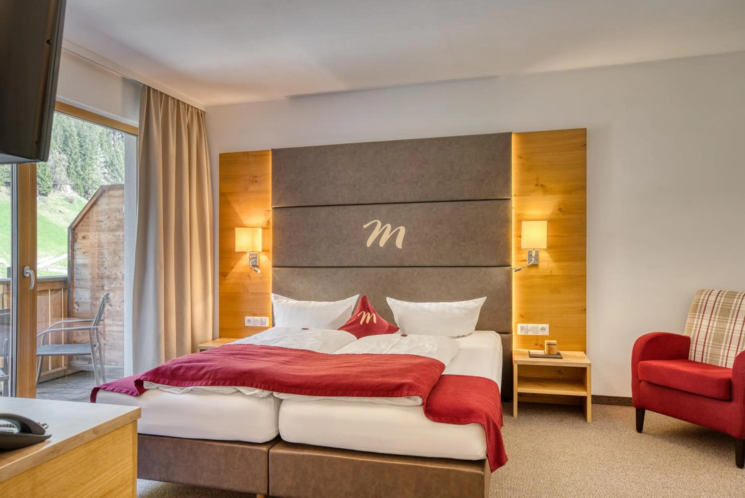 Photo of the whole room, Bed in Mallaun Hotel.Erlebnis