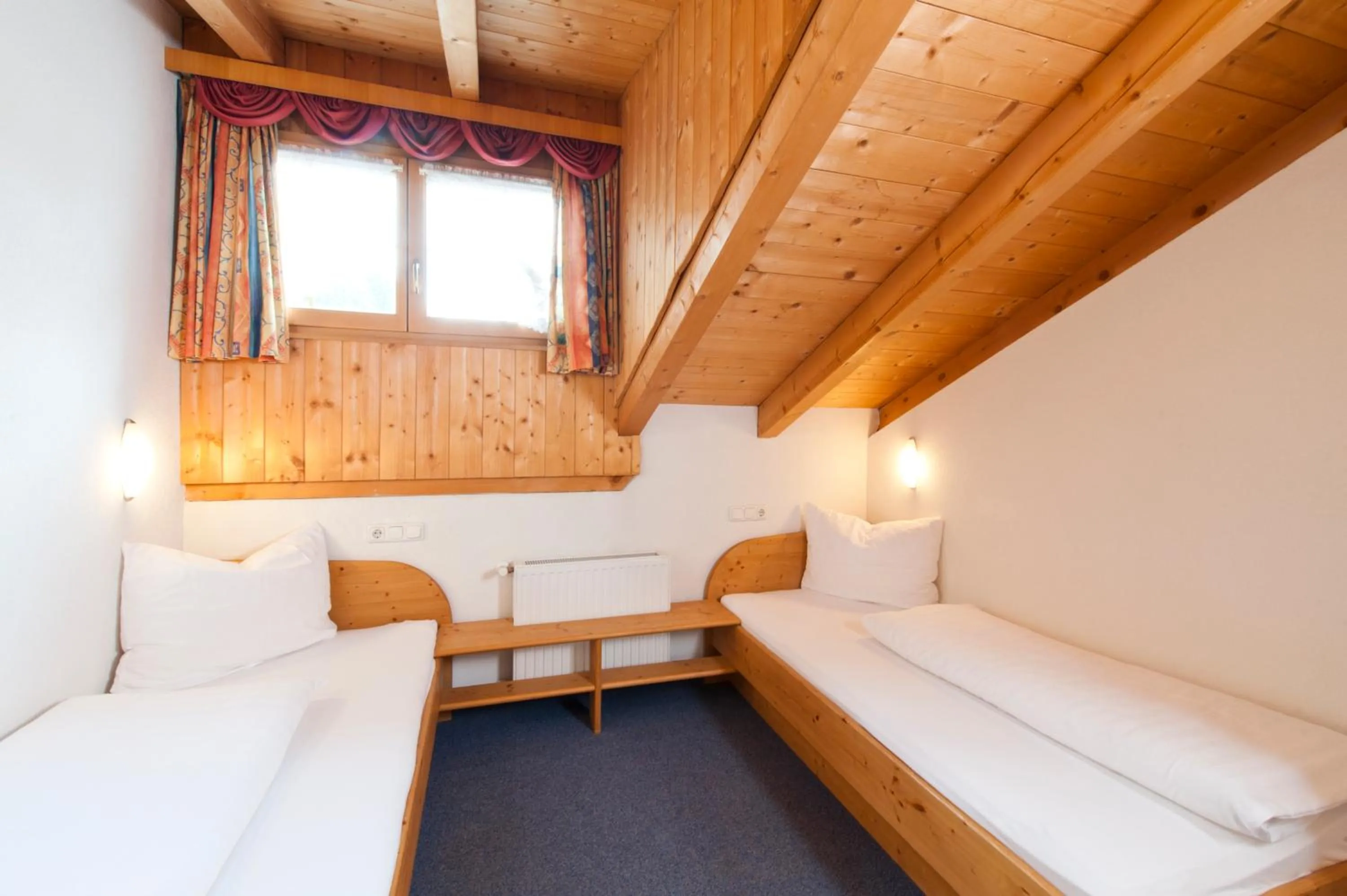 Bedroom, Bed in Mallaun Hotel.Erlebnis