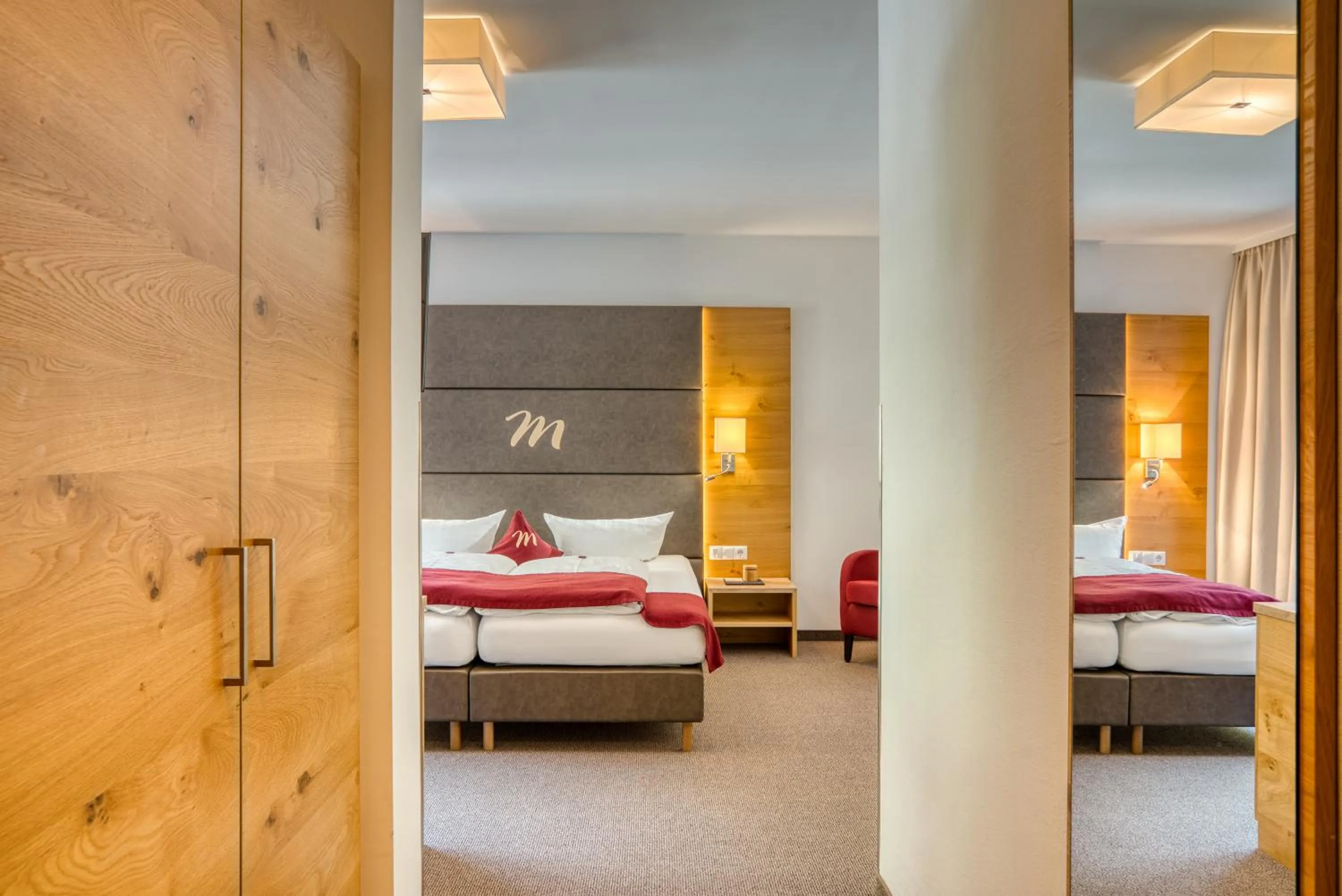 Photo of the whole room, Bed in Mallaun Hotel.Erlebnis