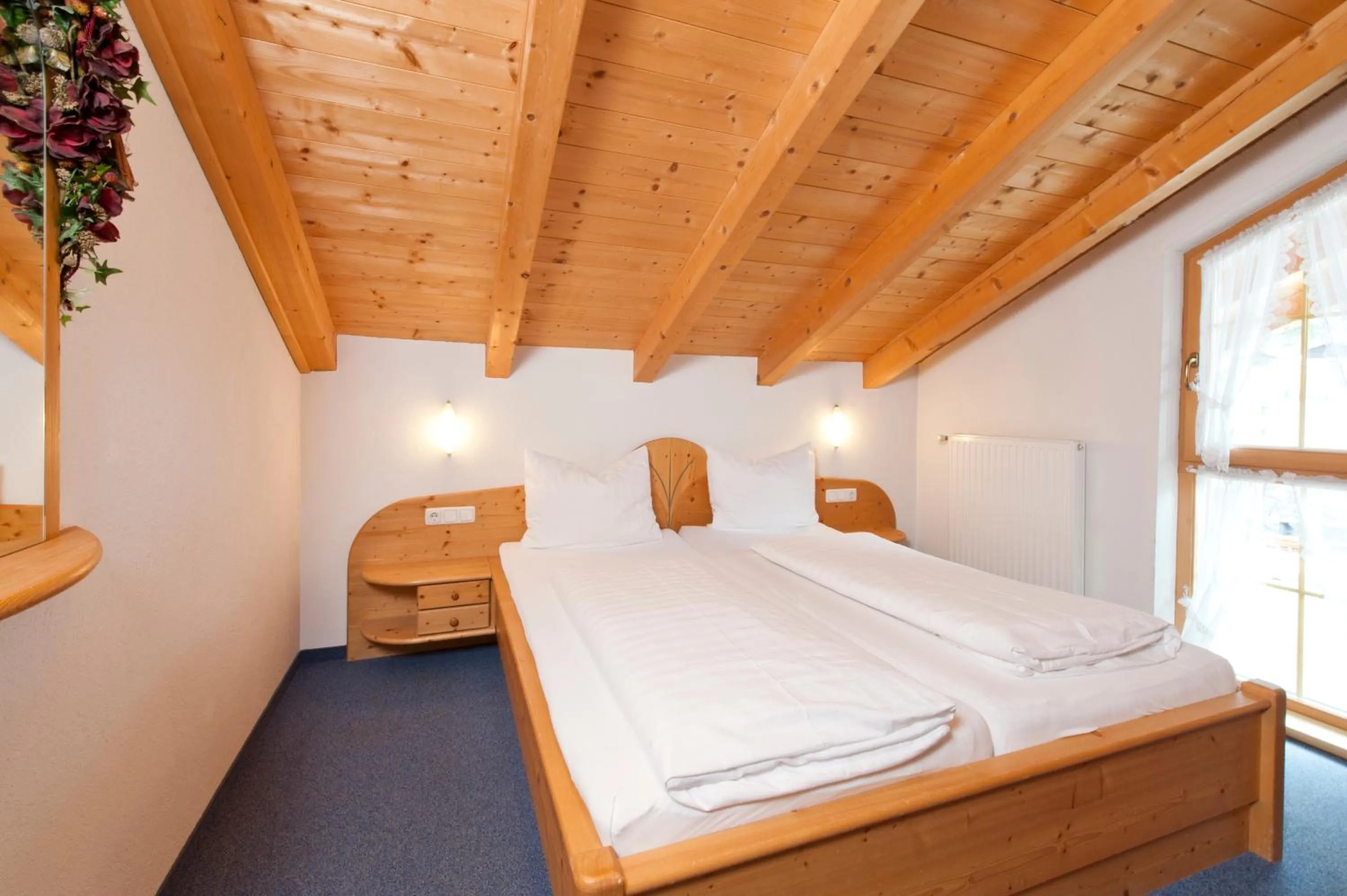 Bedroom, Bed in Mallaun Hotel.Erlebnis