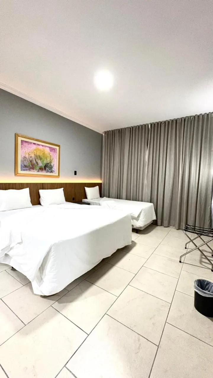 Bed in HOTEL DEL REY CURITIBA by POTY - NA FAMOSA RUA XV DE NOVEMBRO