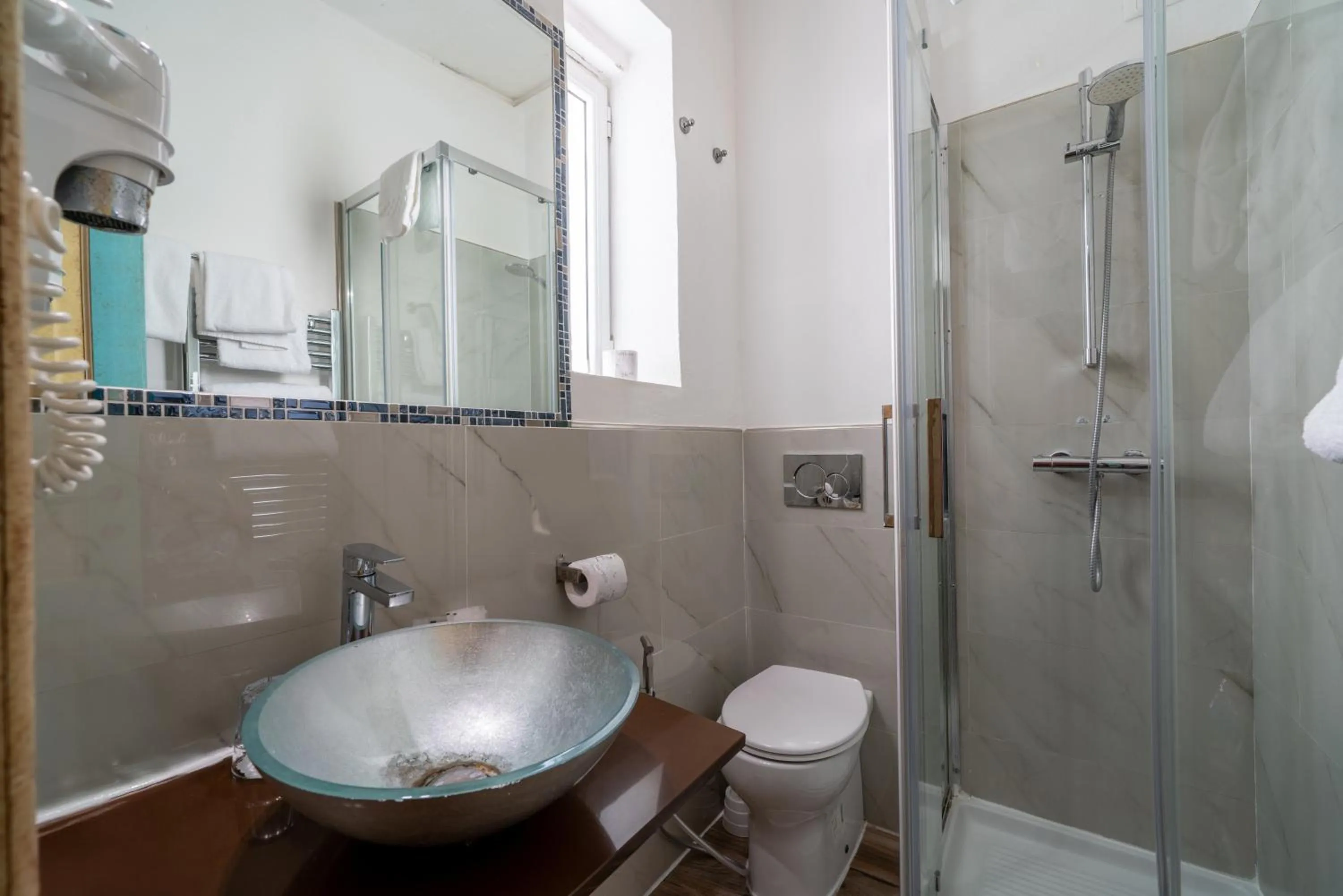 Bathroom in Residenza Conte di Cavour & Rooftop - dBe Hotels