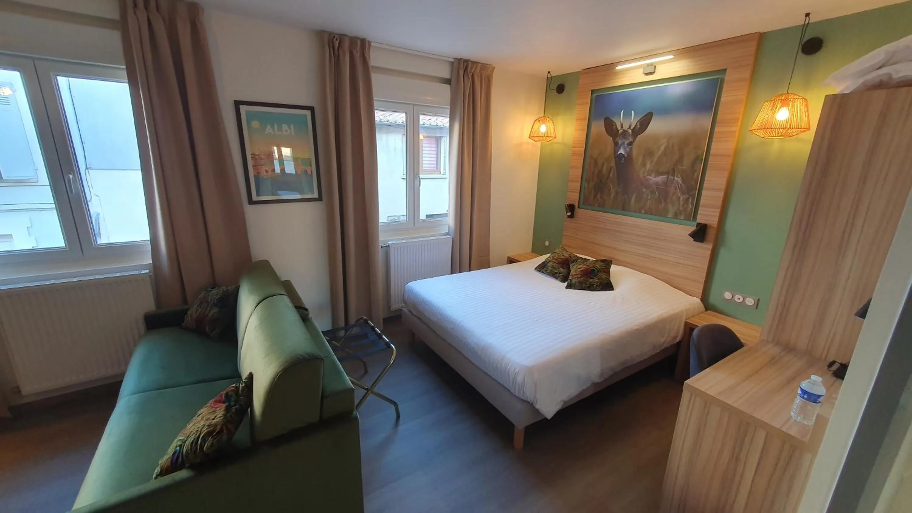 Bed in Logis Hôtel - Les Pasteliers