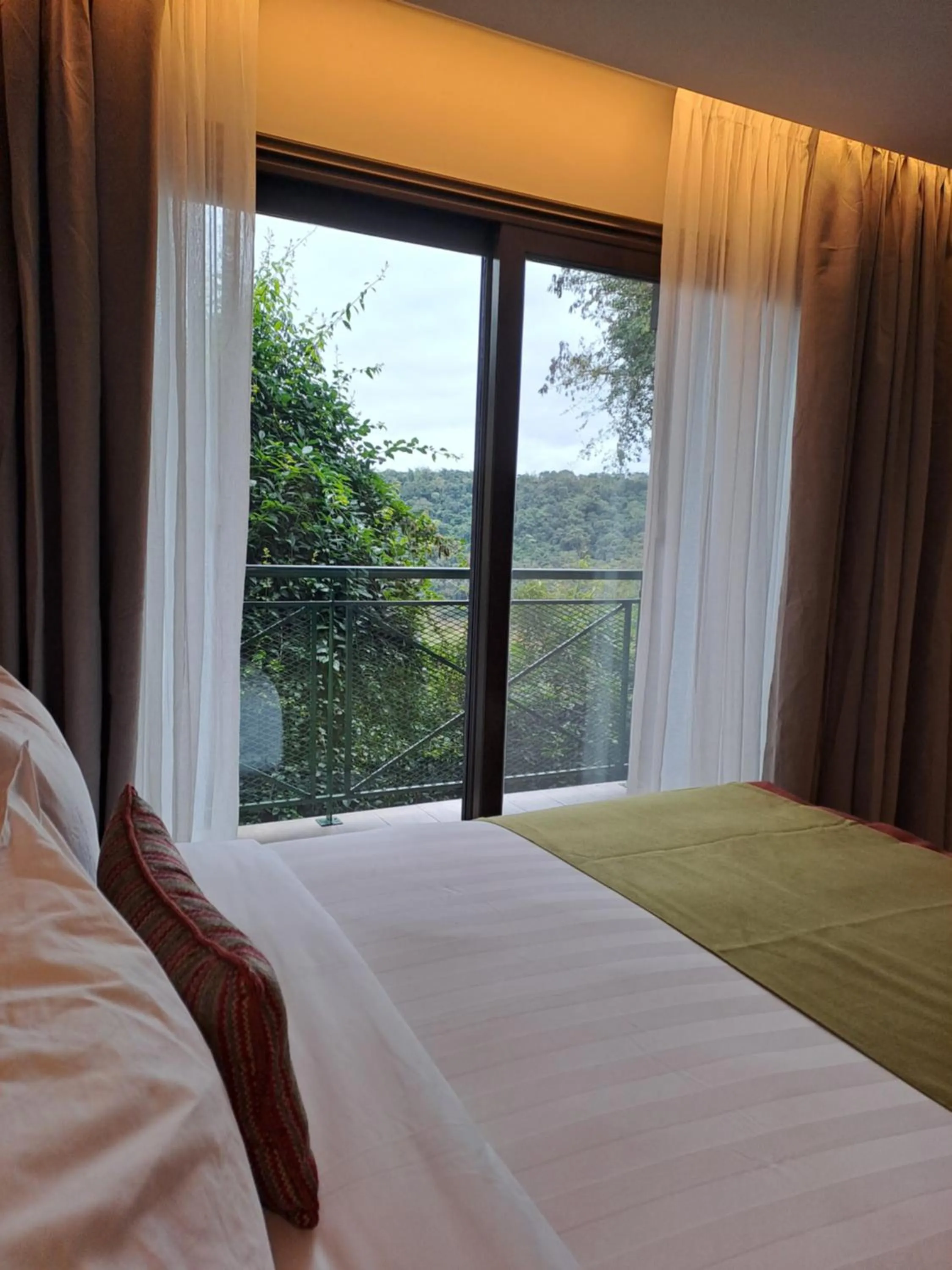 Bed in Iguazu Jungle Lodge