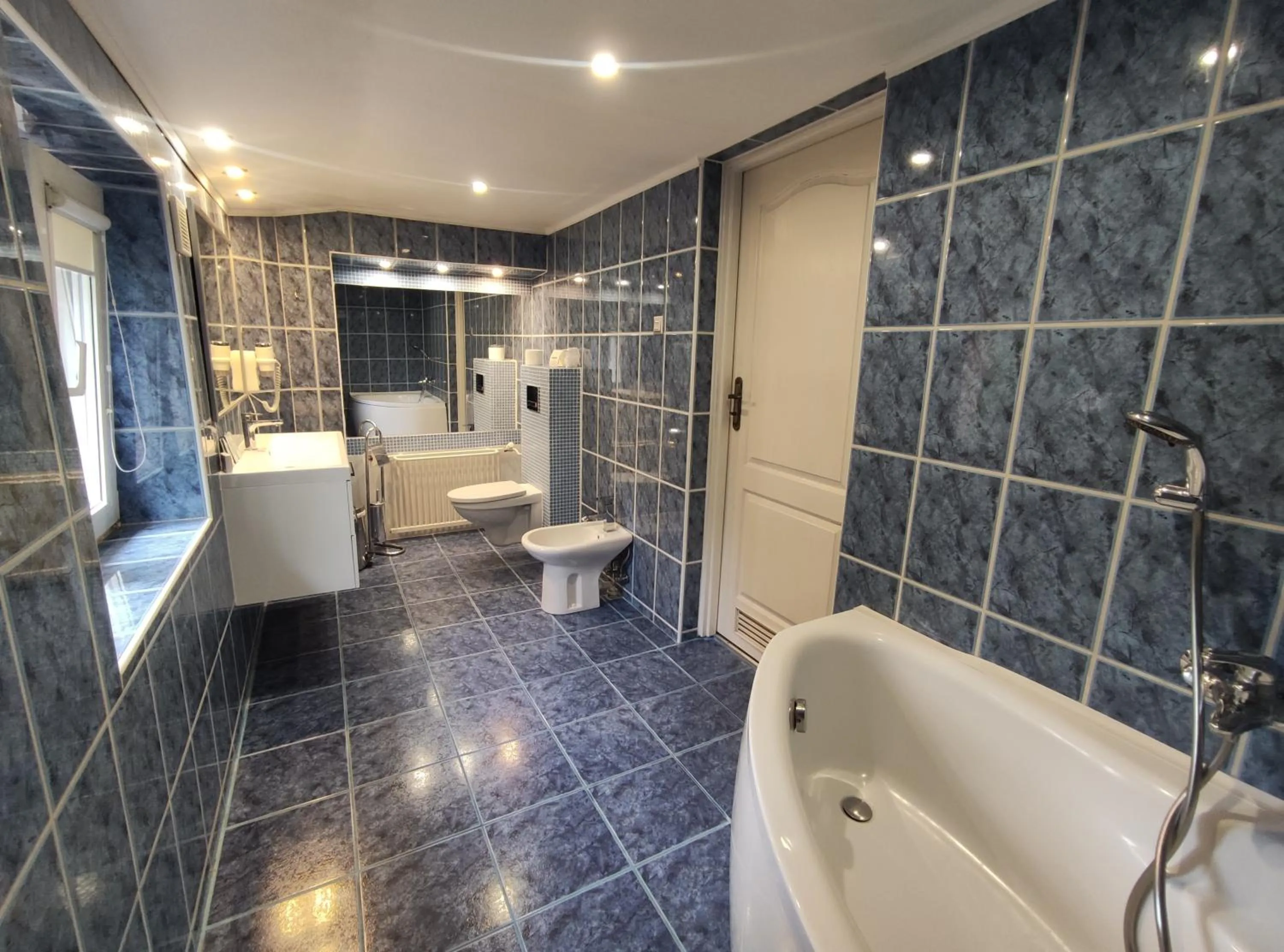 Bathroom in Hotel Atena