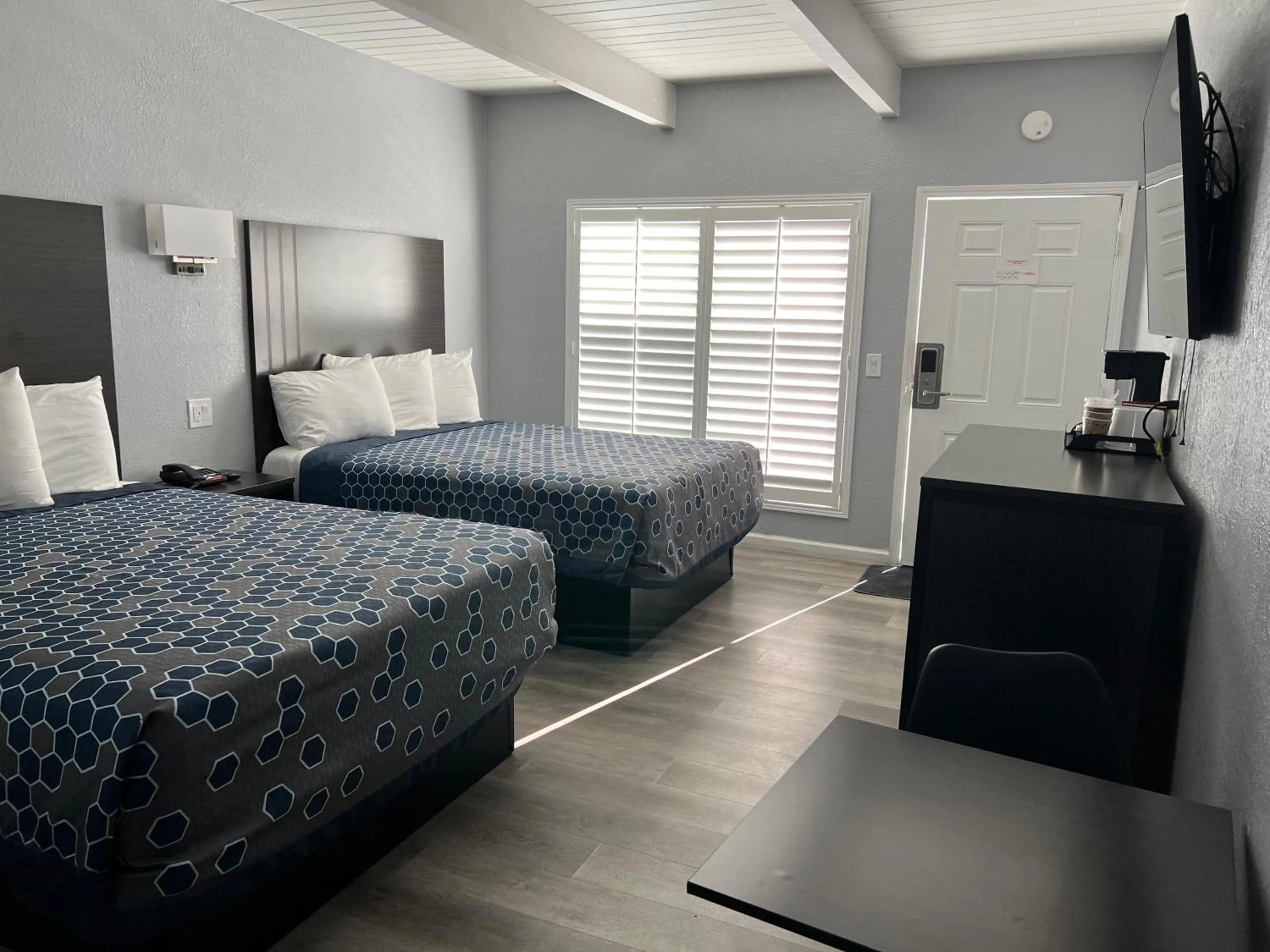 Bed in Sea Garden Inn