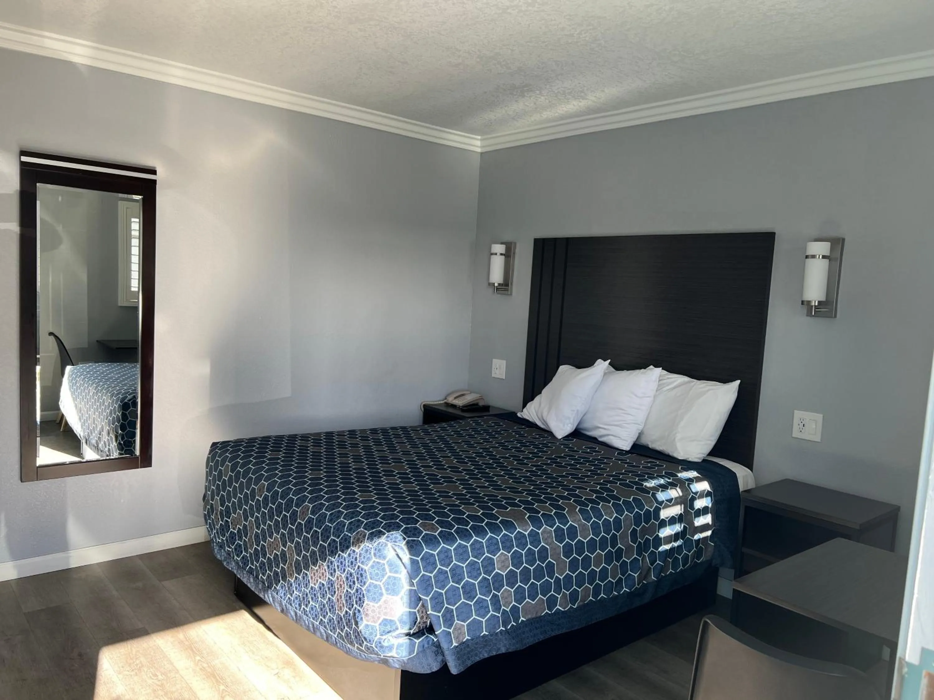 Bed in Sea Garden Inn