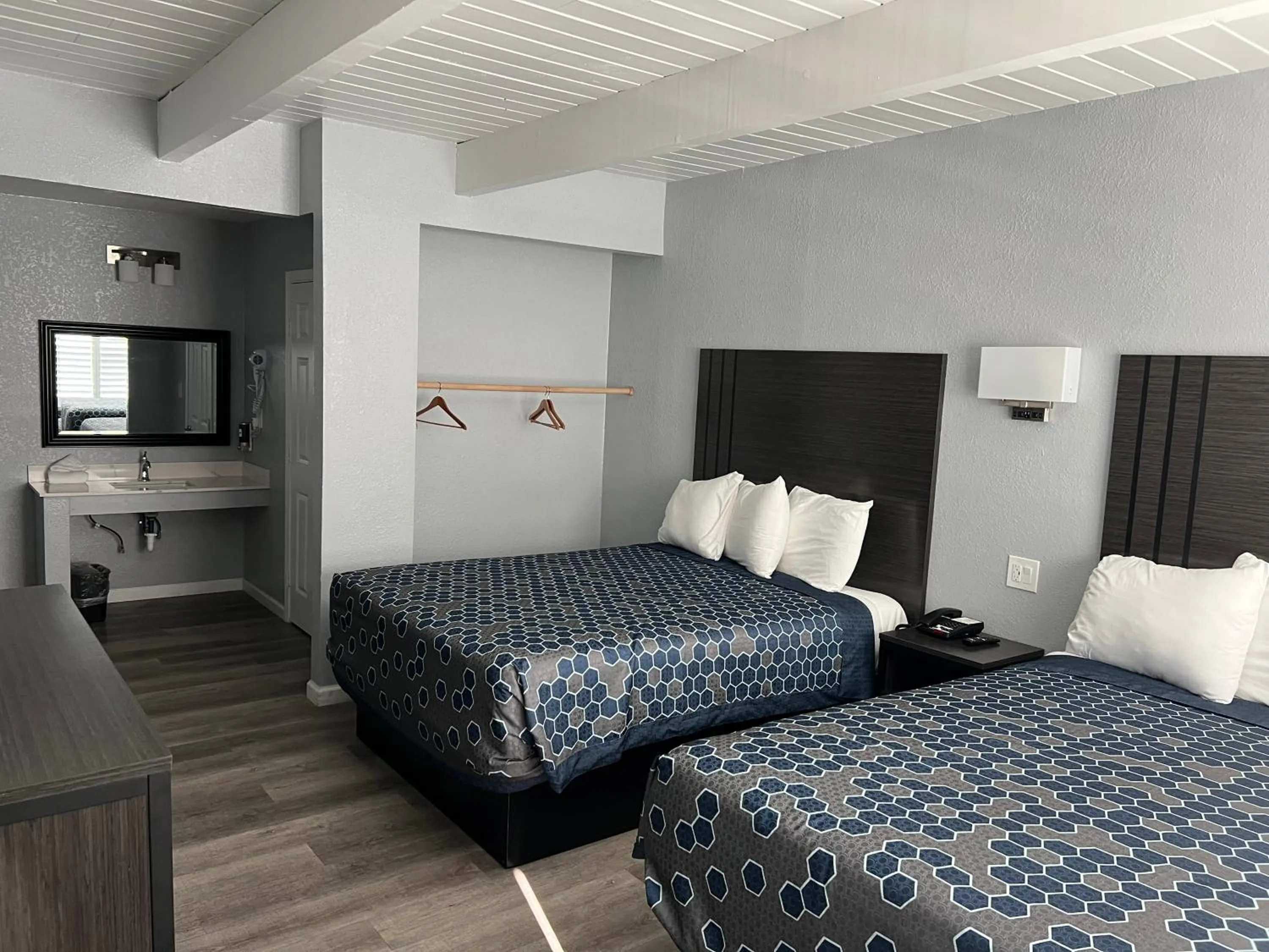 Bed in Sea Garden Inn