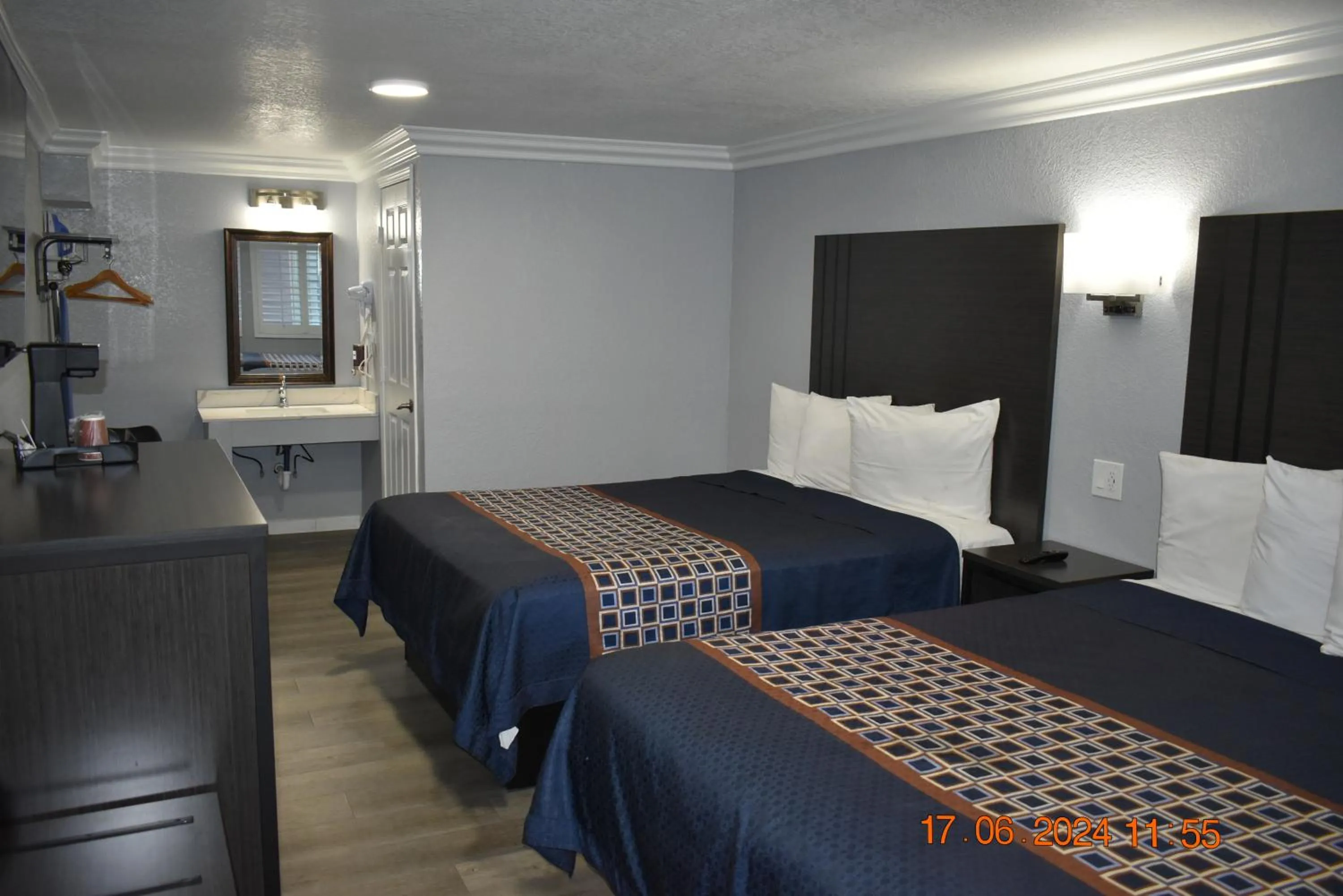 Bed in Sea Garden Inn