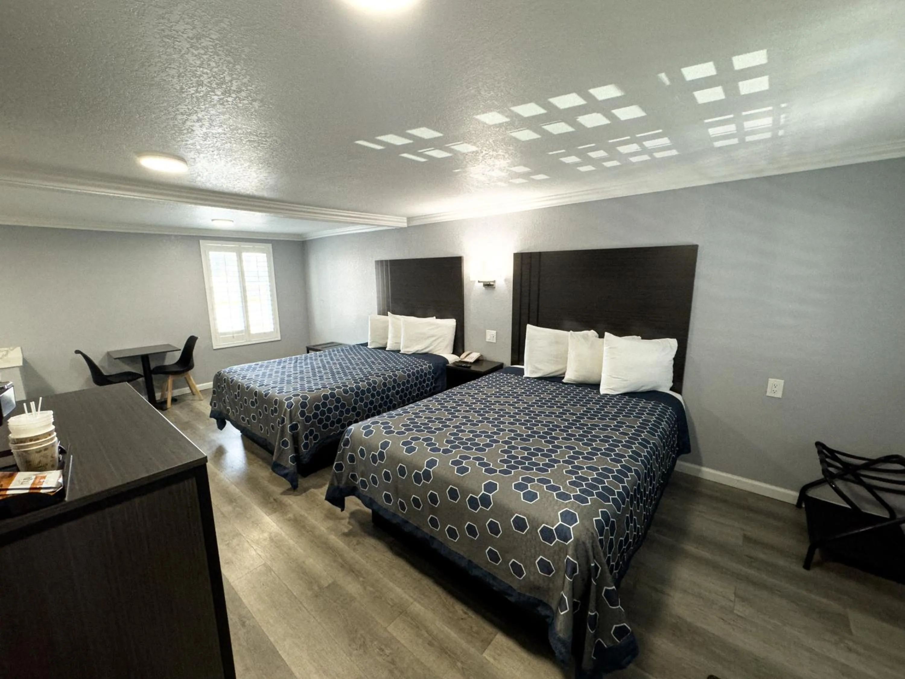 Bed in Sea Garden Inn