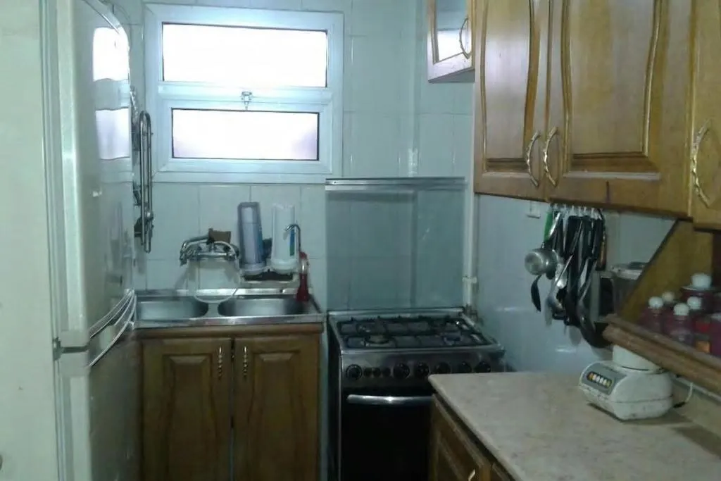 Kitchen or kitchenette in Two-Bedroom Apartment at Al Rehab