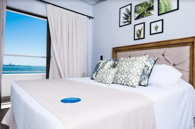 Bed in Hotel Villareal São Francisco do Sul