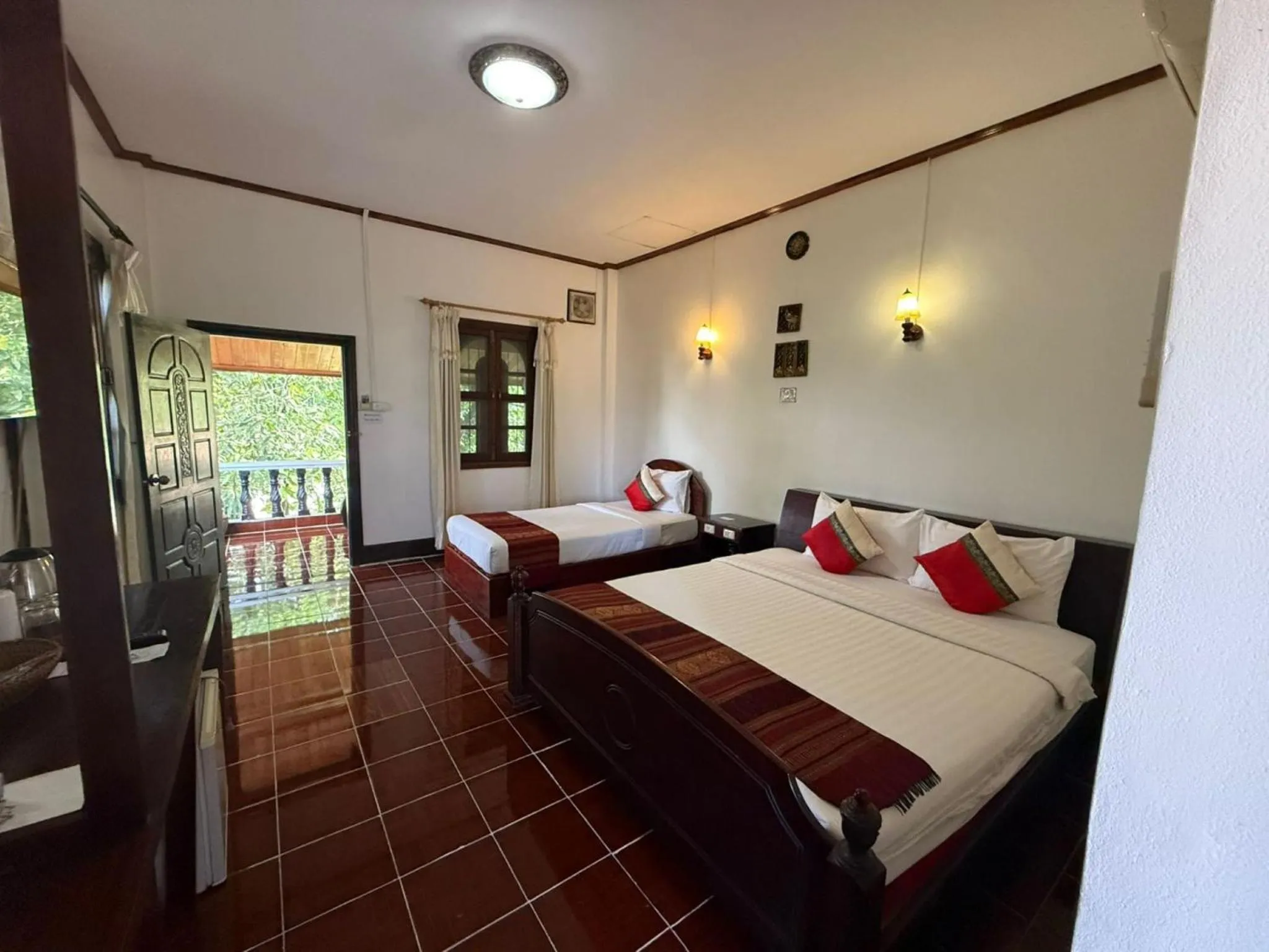 Photo of the whole room, Bed in Vangsavath Hotel