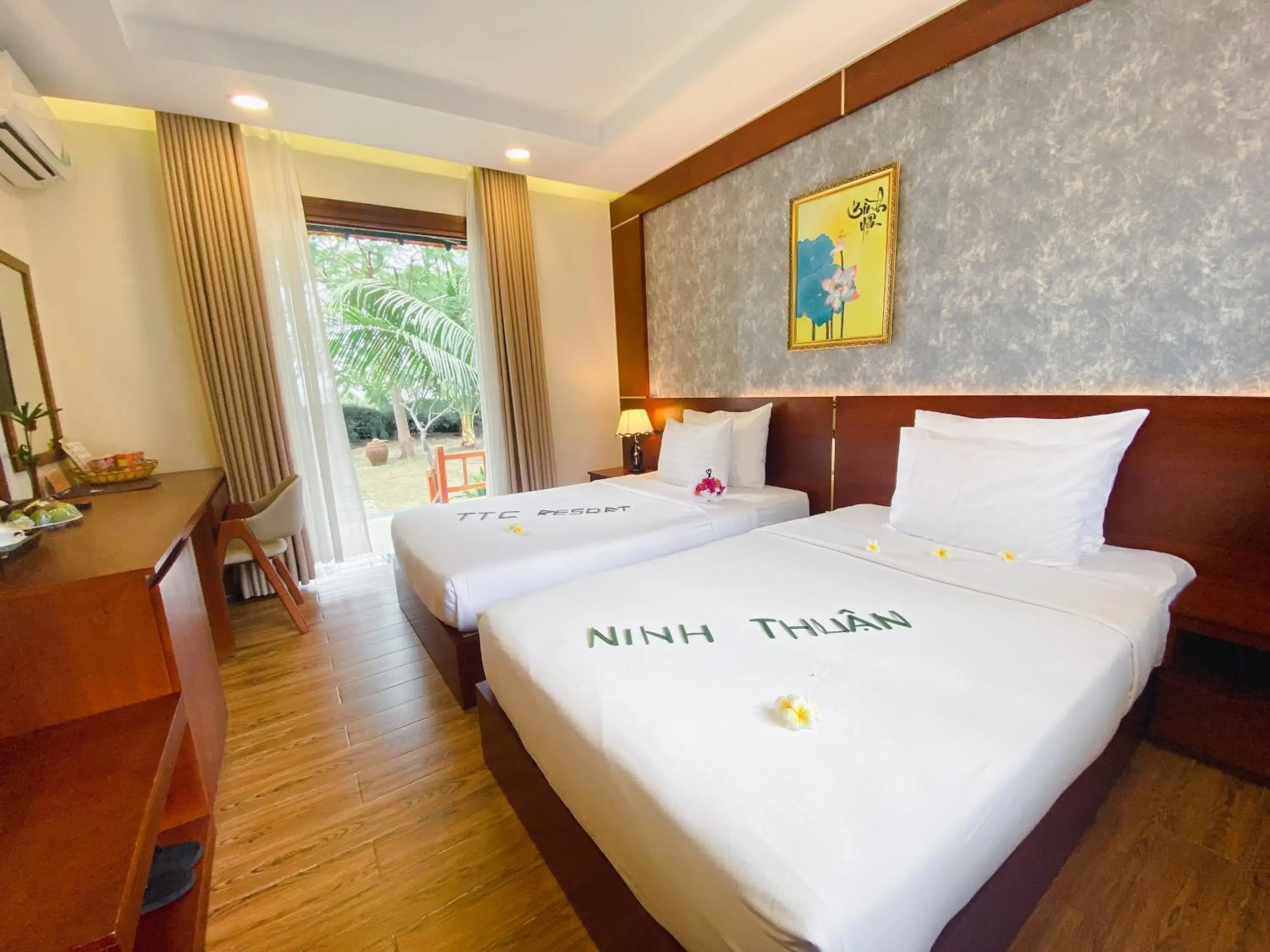 Superior Bungalow Twin Room with Terrace - Garden View in TTC Resort Ninh Thuan - Unlimited Access to Water Park Superior Bungalow Twin Room with Terrace - Garden View in TTC Resort Ninh Thuan - Unlimited Access to Water Park