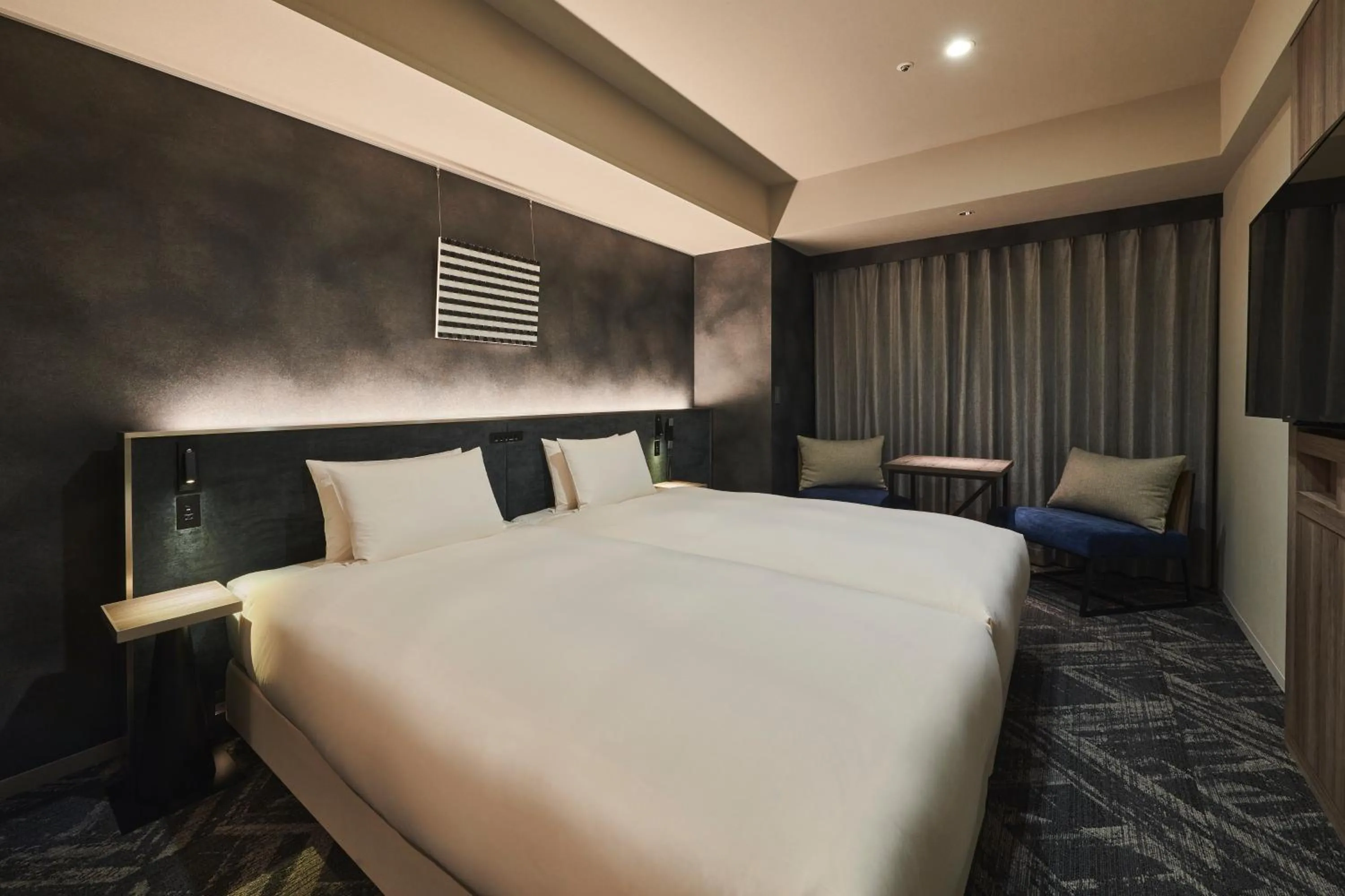 Bed in Cross Hotel Sapporo