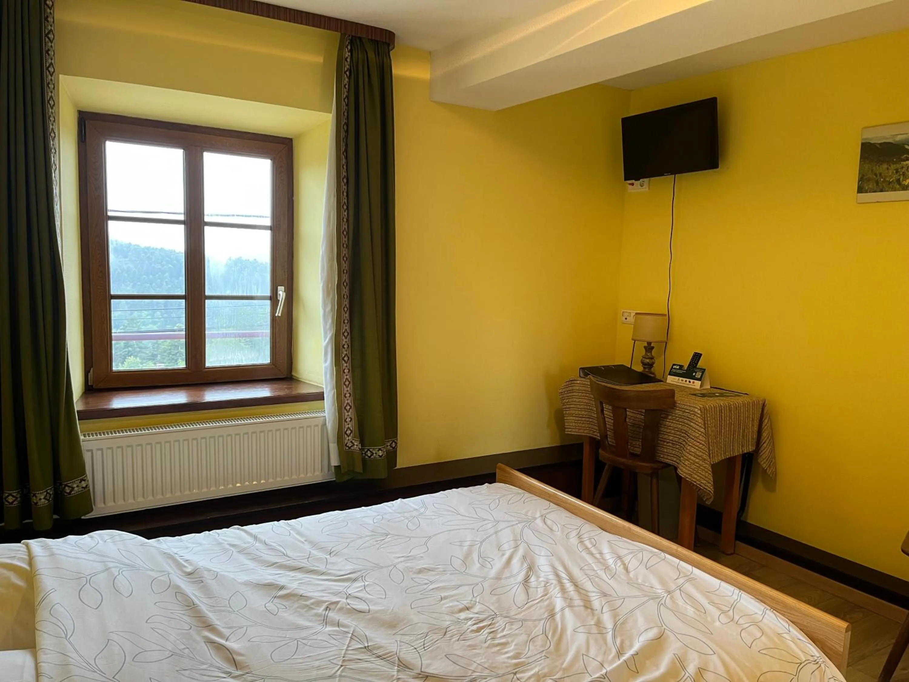 Bed in Logis Hotel & Restaurant - Les Vosges