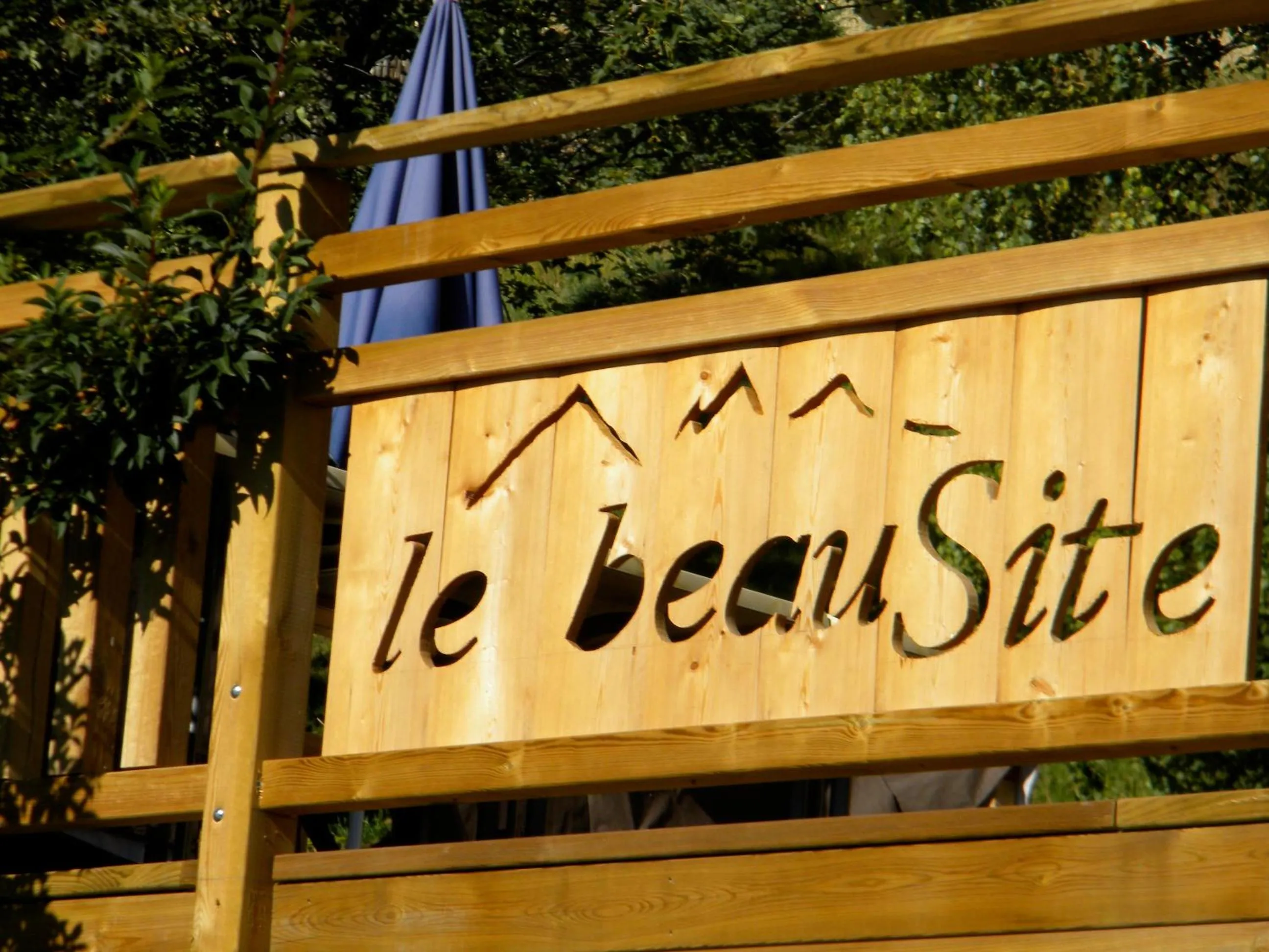 Property logo or sign in Hotel Le Beau Site