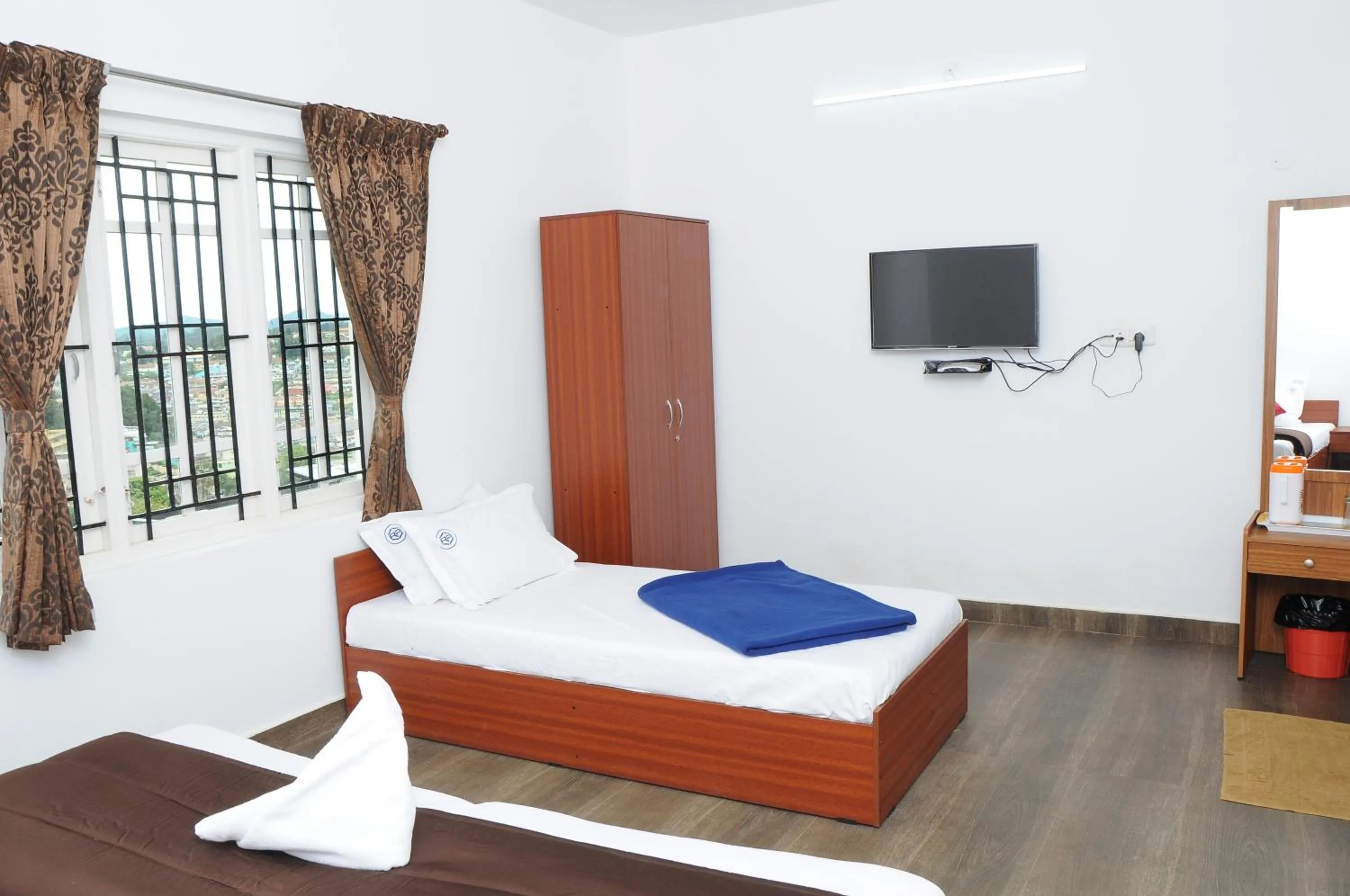 Bed in Rosepark Residency