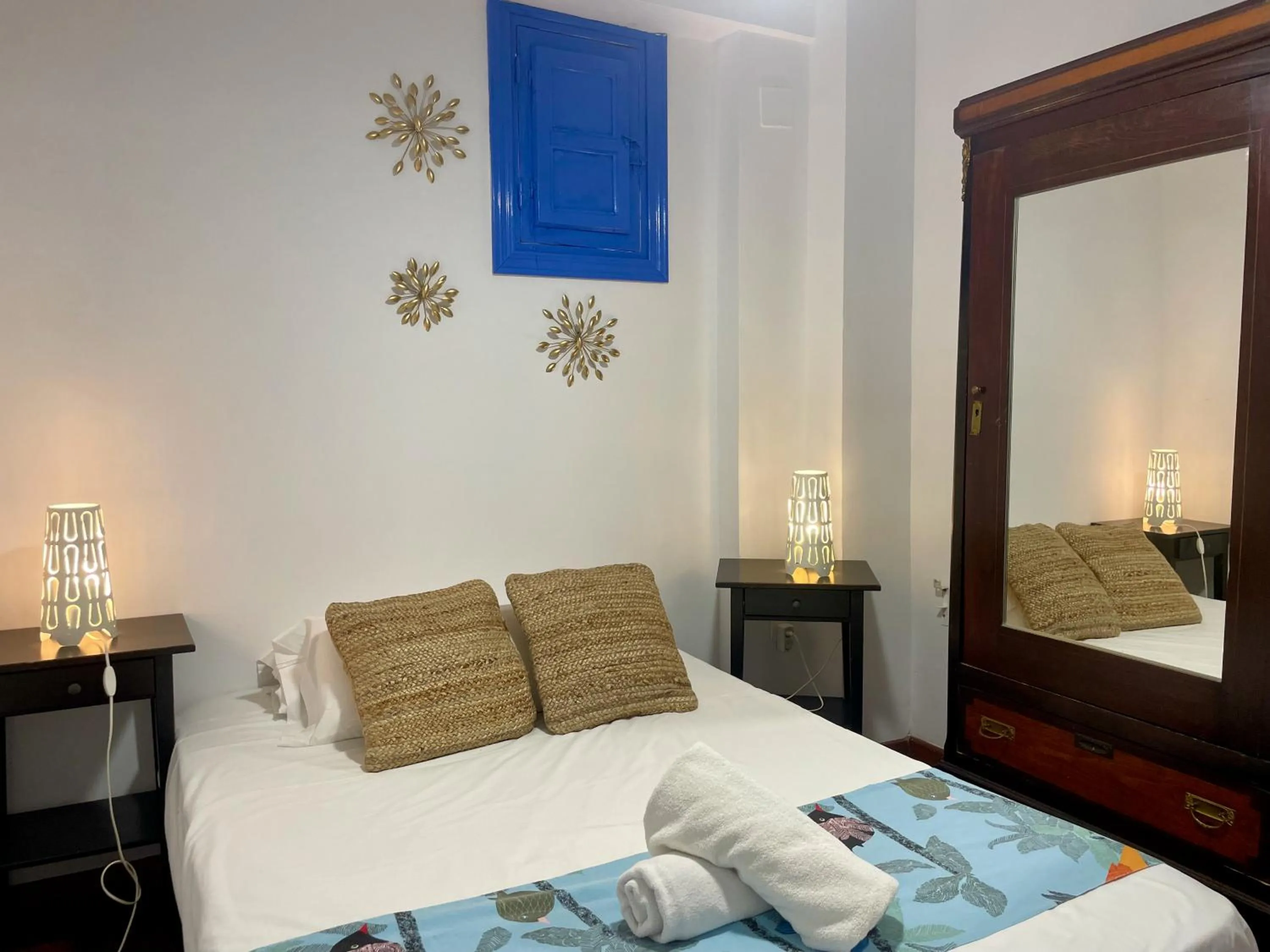 Bed in Apartamentos Inside Paseo de los Tristes