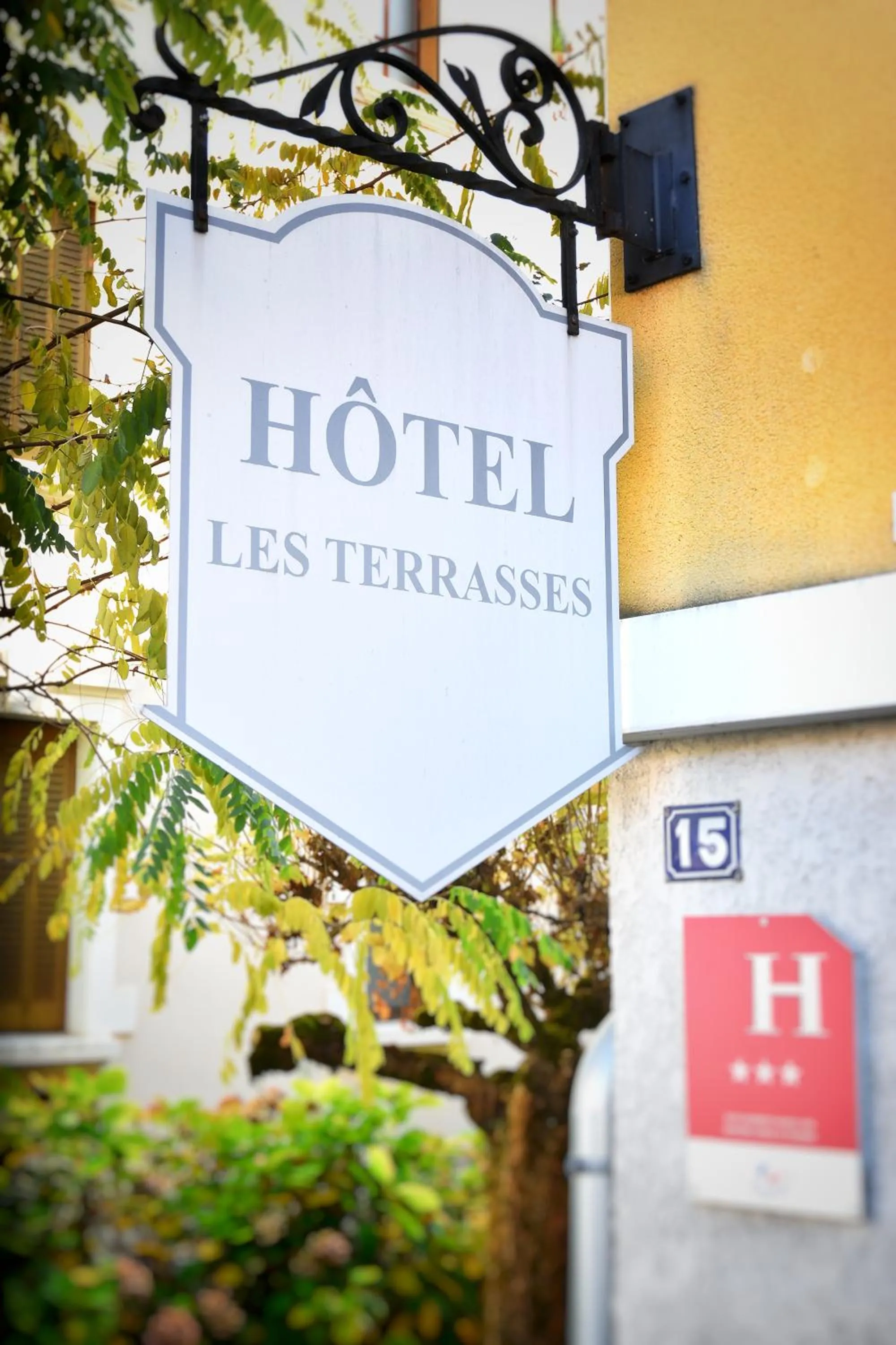 Property logo or sign in Hotel Les Terrasses