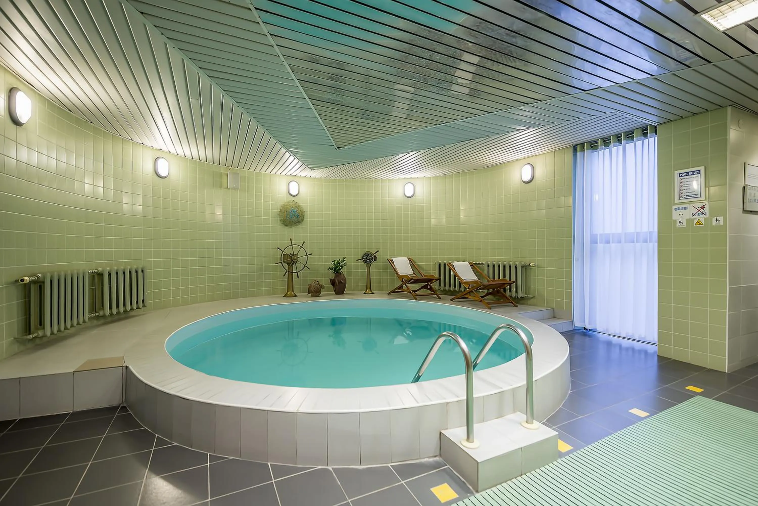 Swimming pool in Grata by Centrum Hotels