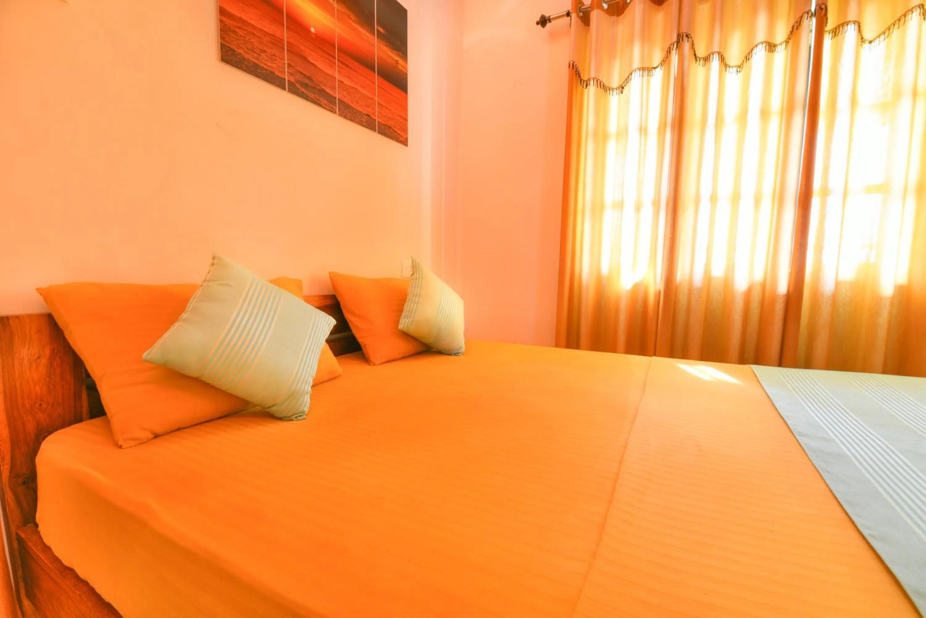 Bed in Monarch Suites