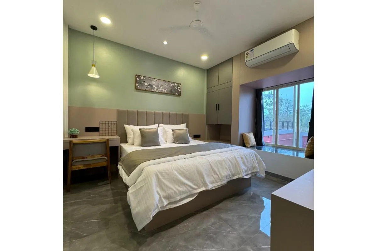 Bed in Hotel Sadhana Executive