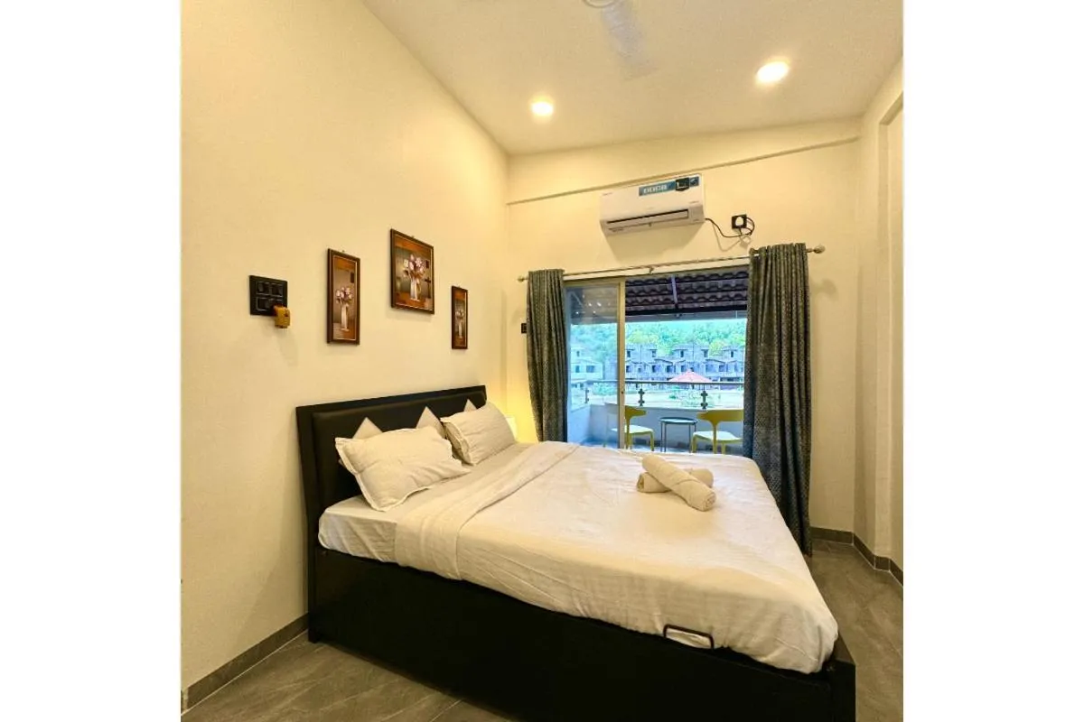 Bed in Hotel Sadhana Executive