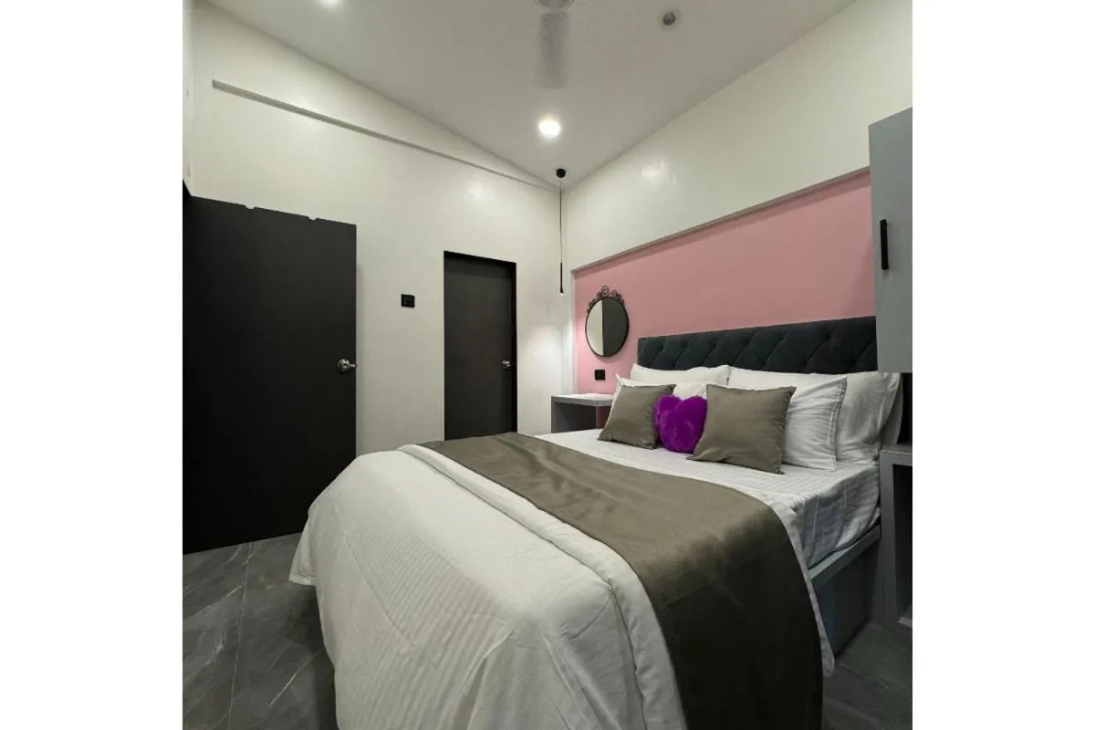 Bed in Hotel Sadhana Executive