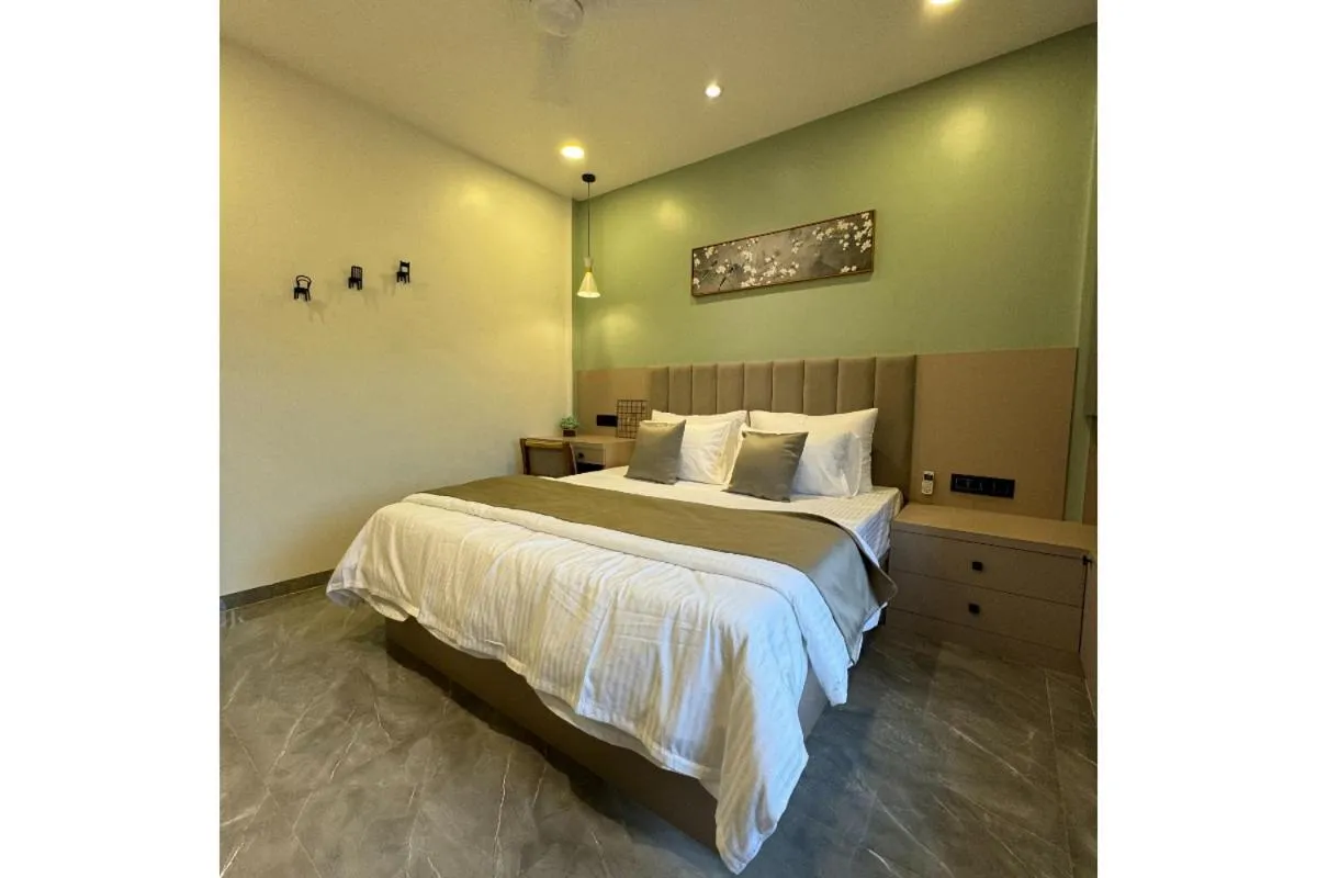 Bed in Hotel Sadhana Executive