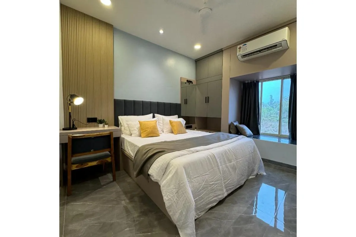 Bed in Hotel Sadhana Executive