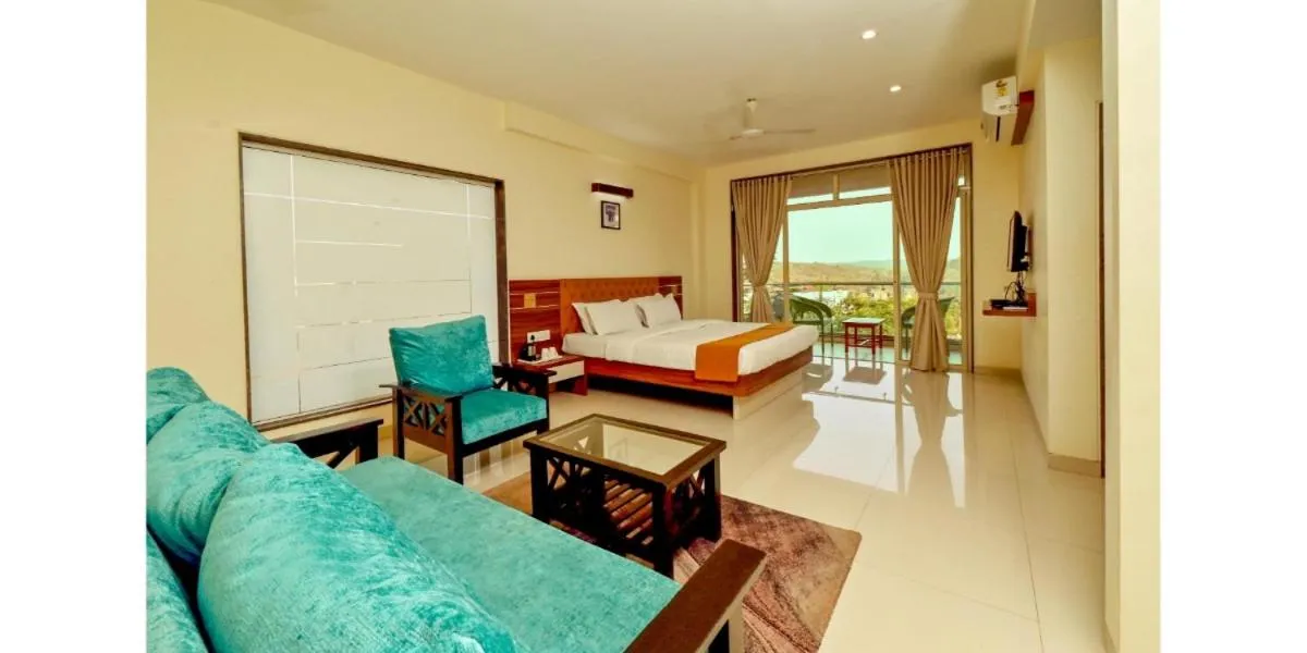 Bed in Hotel Sadhana Executive