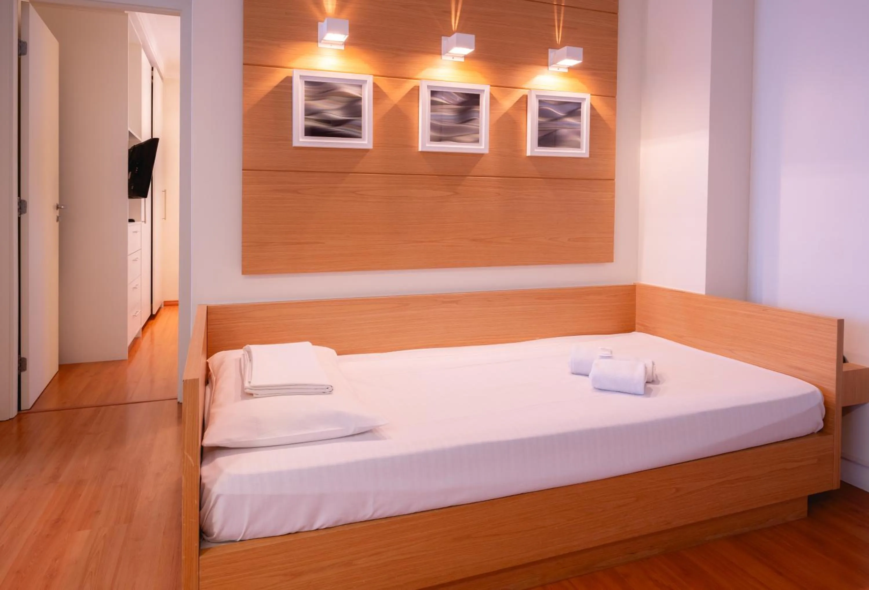 Bed in eSuítes Congonhas by Atlantica